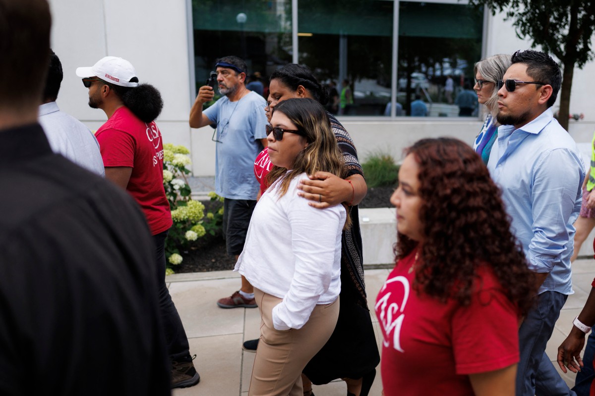 Jennifer Vasquez Sura, the wife of Kilmar Abrego Garcia (center white shirt), enters the courthouse for a hearing regarding her husband's possible release at Fred D Thompson Federal Building & Courthouse on June 25, 2025 in Nashville, Tennessee [Brett Carlsen/Getty Images/AFP]