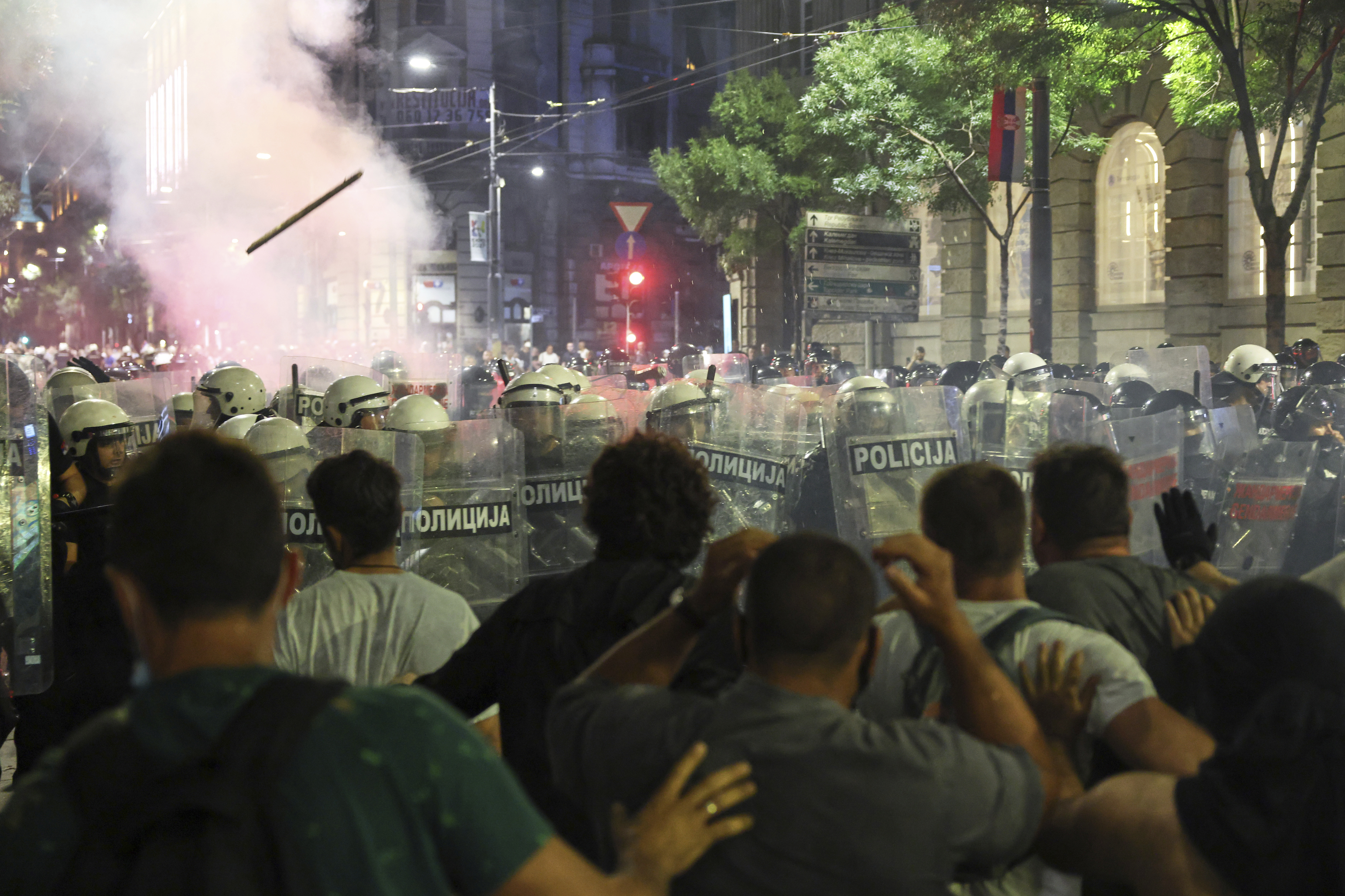 Anti-government protesters clash with riot police in Serbia