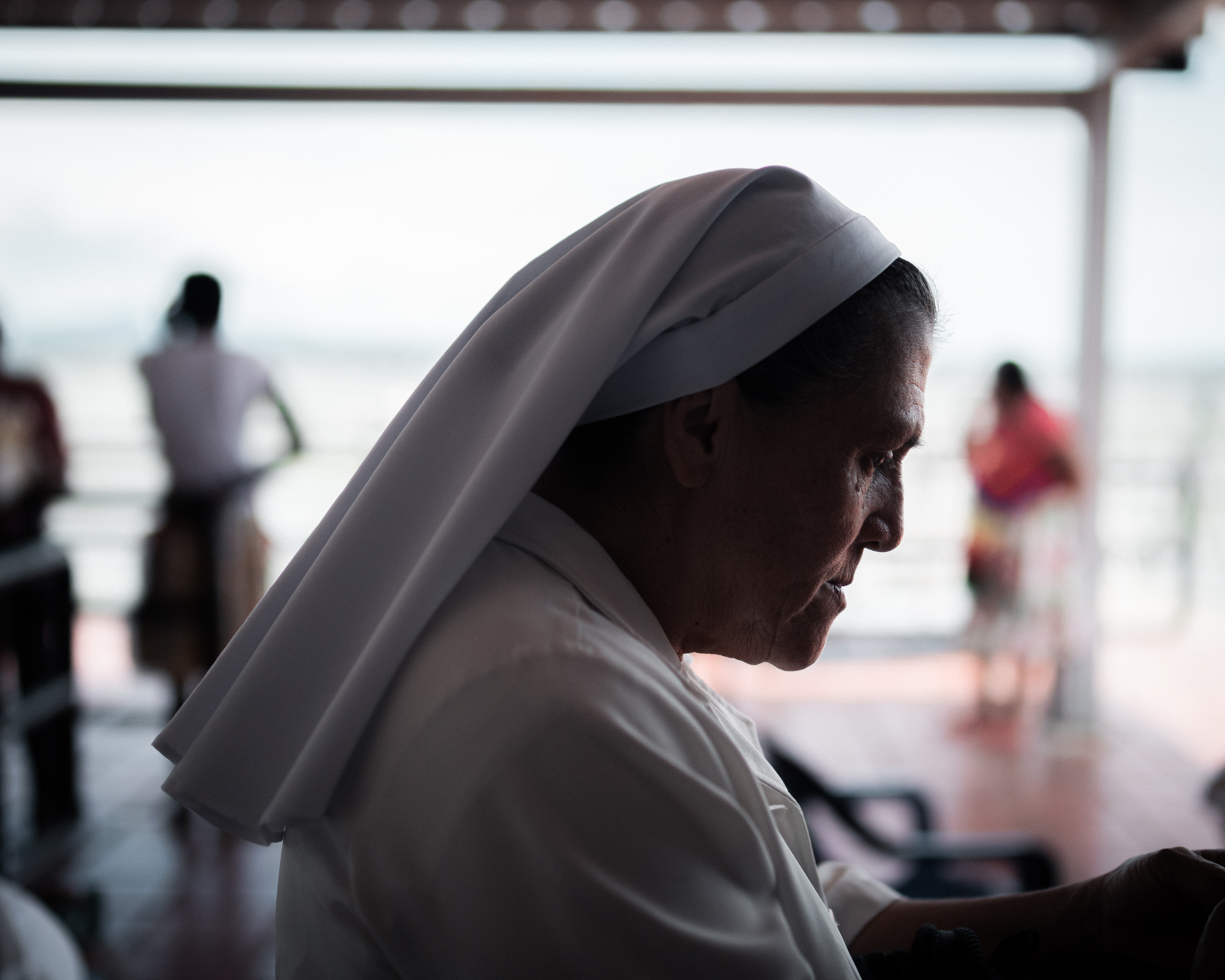 Sister Maria Elena in profile, with a white wimple