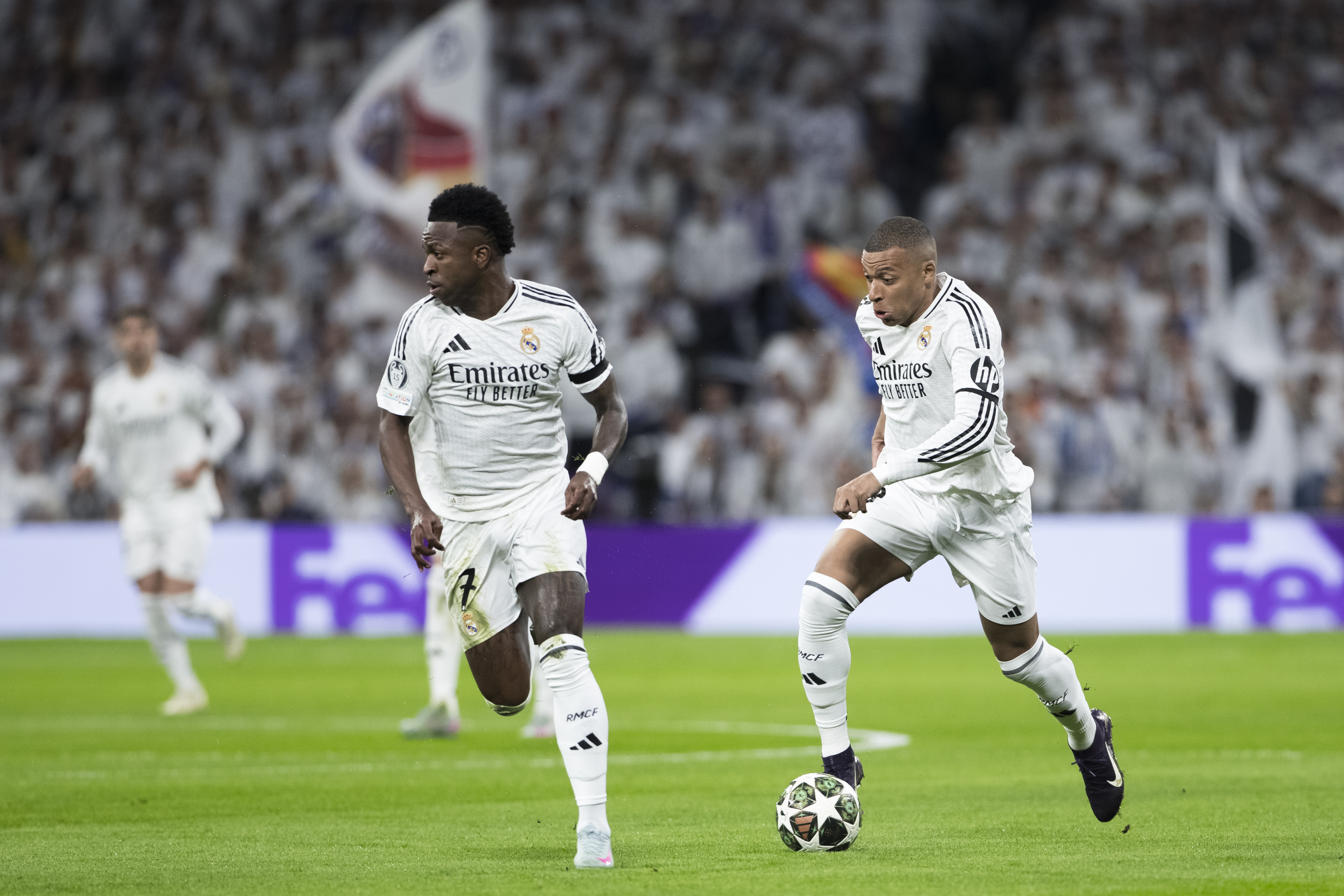 Vinicius Jr and Kylian Mbappe in action.