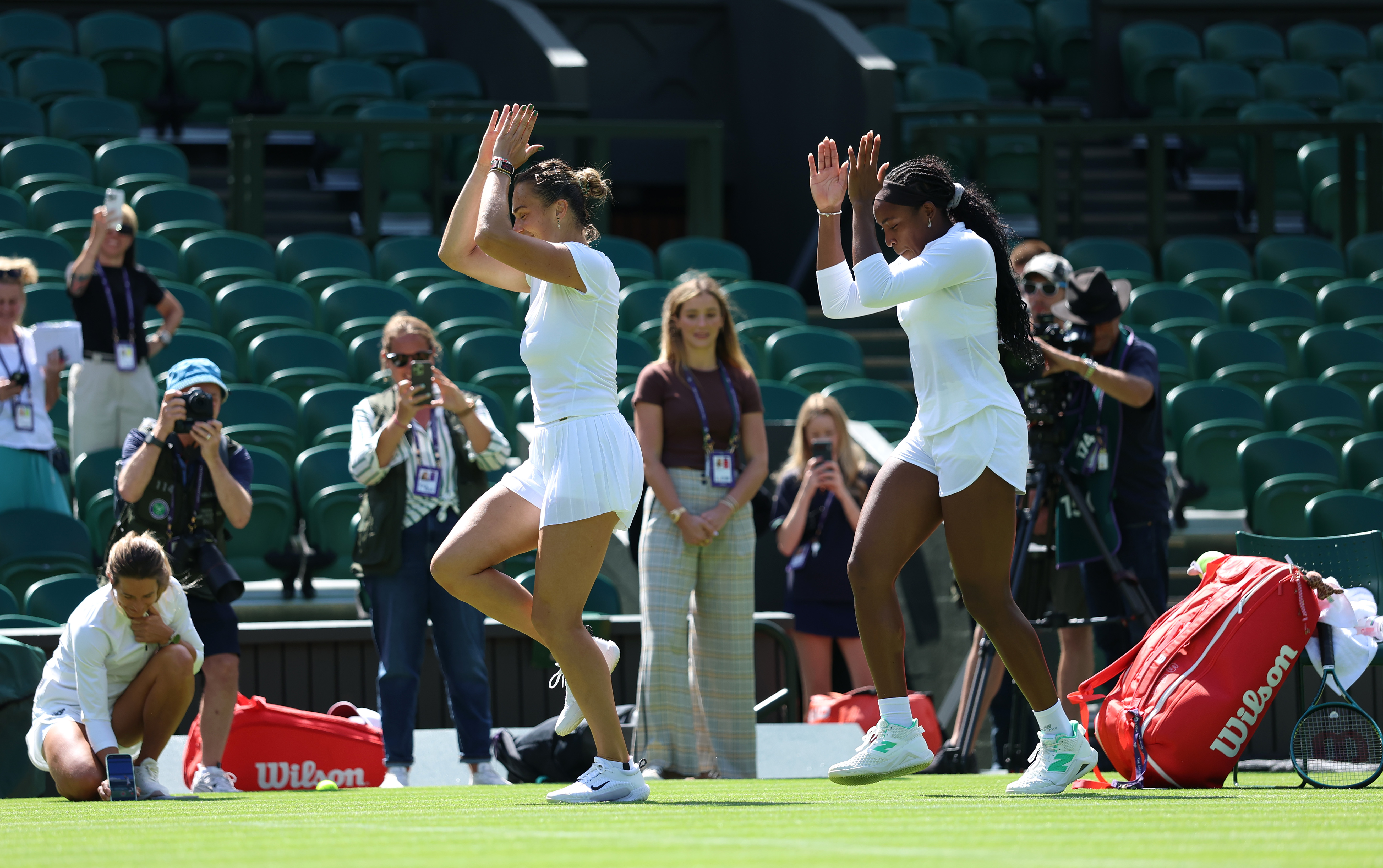 LONDON, ENGLAND - JUNE 27: Aryna Sabalenka and Coco Gauff of United States dance together after a practice session prior to The Championships Wimbledon 2025 at All England Lawn Tennis and Croquet Club on June 27, 2025 in London, England. (Photo by Dan Istitene/Getty Images)