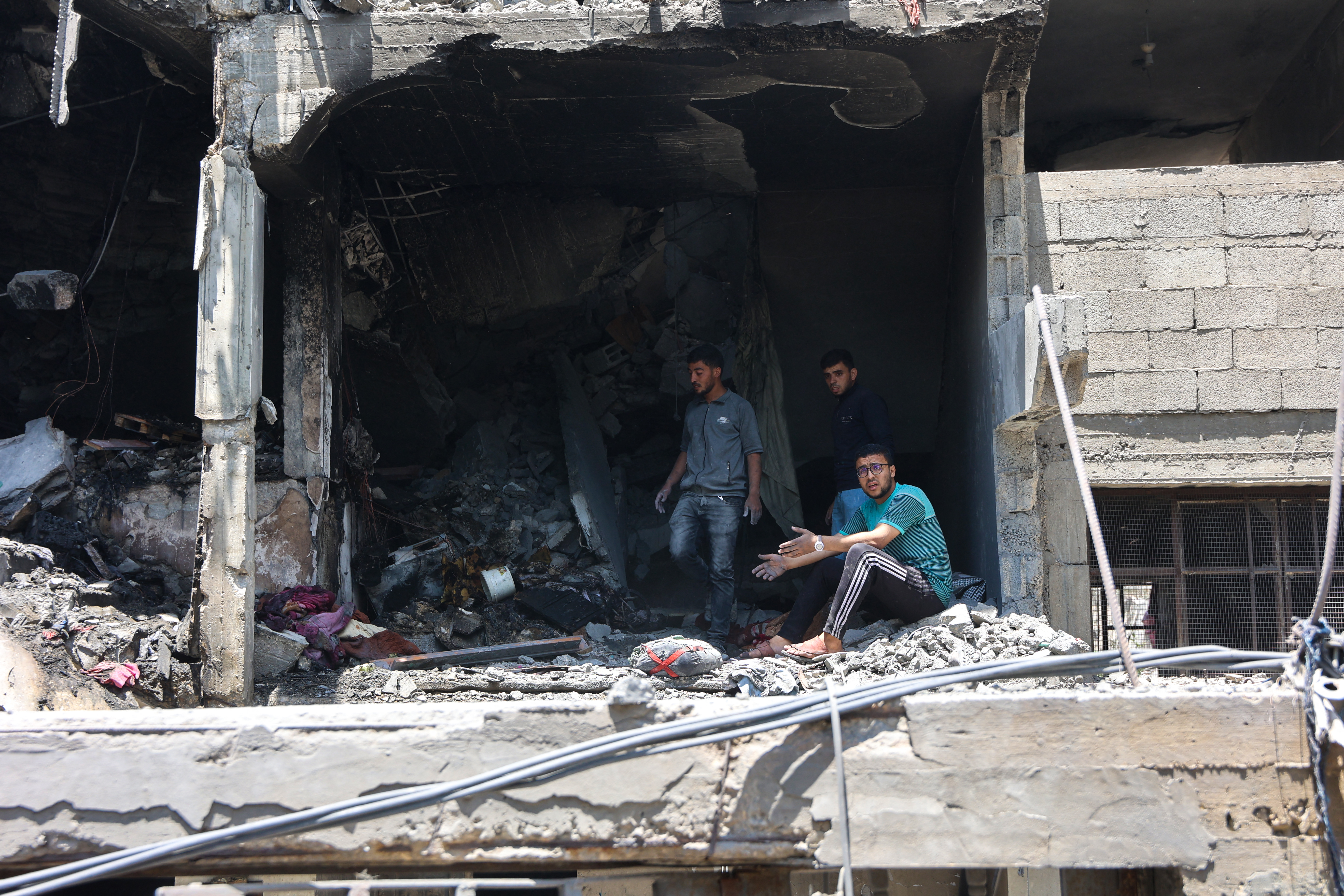 People look for survivors following an Israeli strike that targeted the home of the al-Bursh family in Jabalia in the northern Gaza Strip on June 2, 2025.