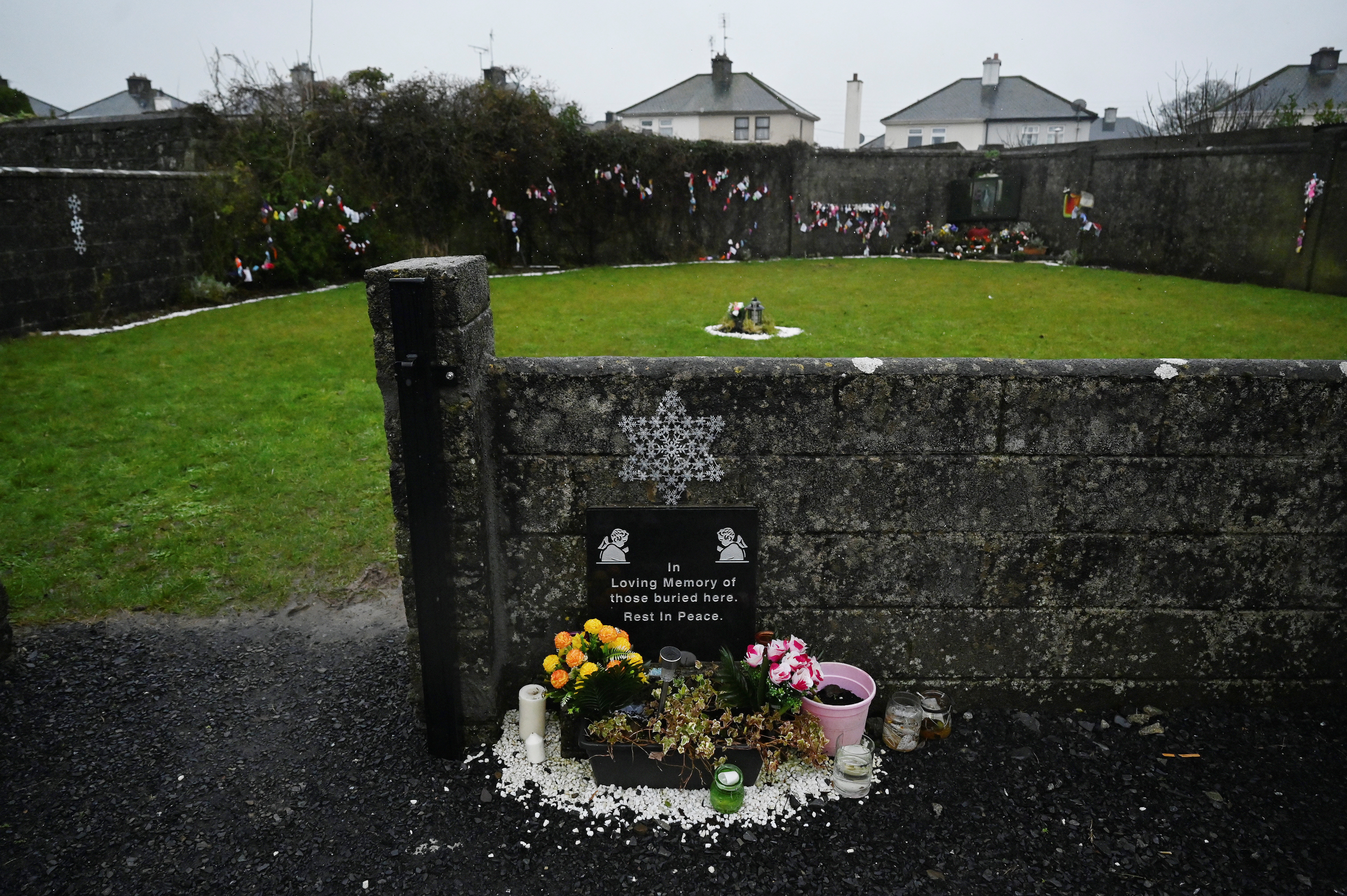 General view of the Tuam graveyard, where the bodies of 796 babies were uncovered at the site of a former Catholic home for unmarried mothers and their children, on the day a government-ordered inquiry into former Church-run homes for unmarried mothers is formally published, in Tuam, Ireland,