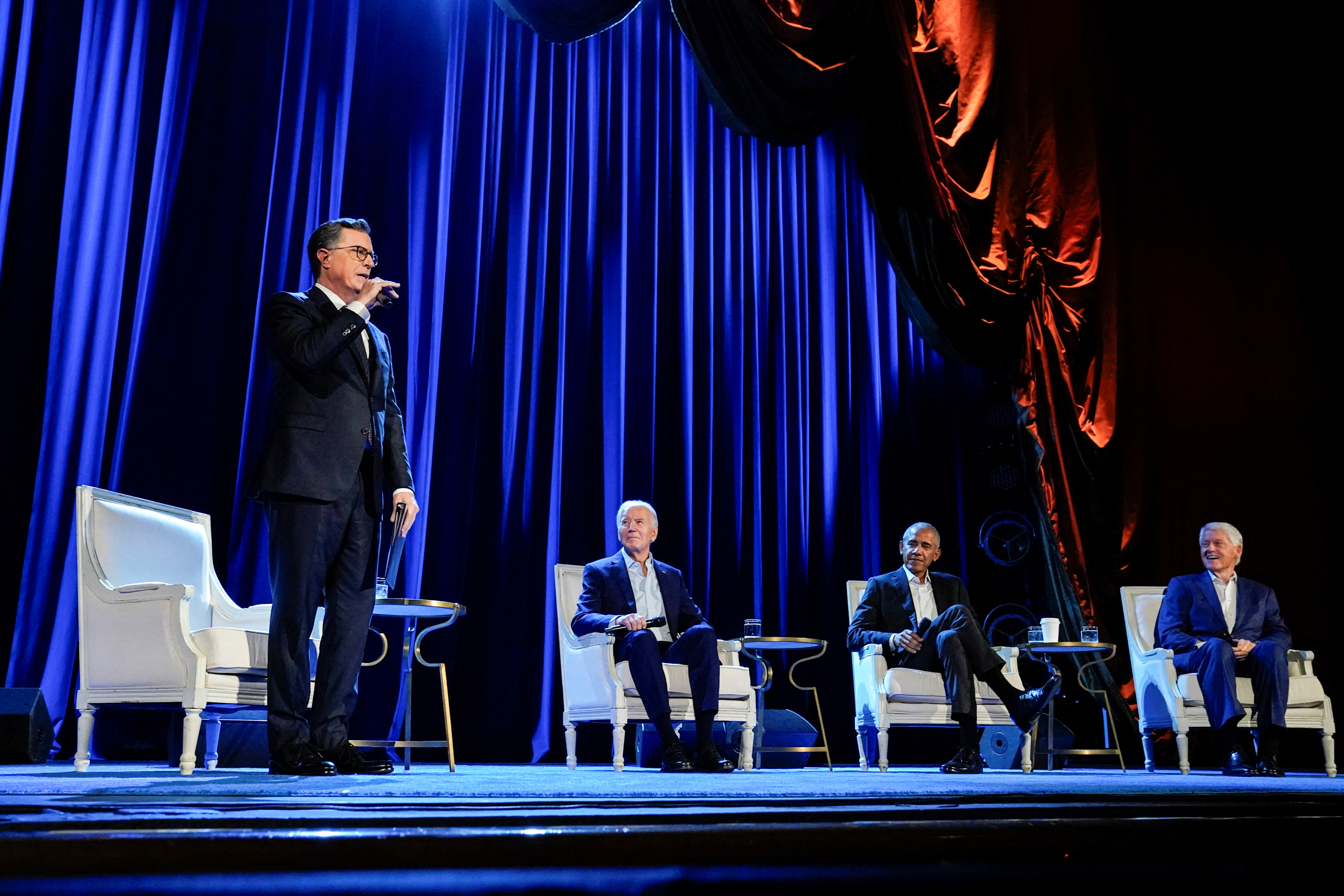 U.S. President Joe Biden, former U.S. Presidents Barack Obama and Bill Clinton participate in a discussion moderated by Stephen Colbert, host of CBS's "The Late Show with Stephen Colbert", during a campaign fundraising event at Radio City Music Hall in New York, U.S., March 28, 2024. REUTERS/Elizabeth Frantz