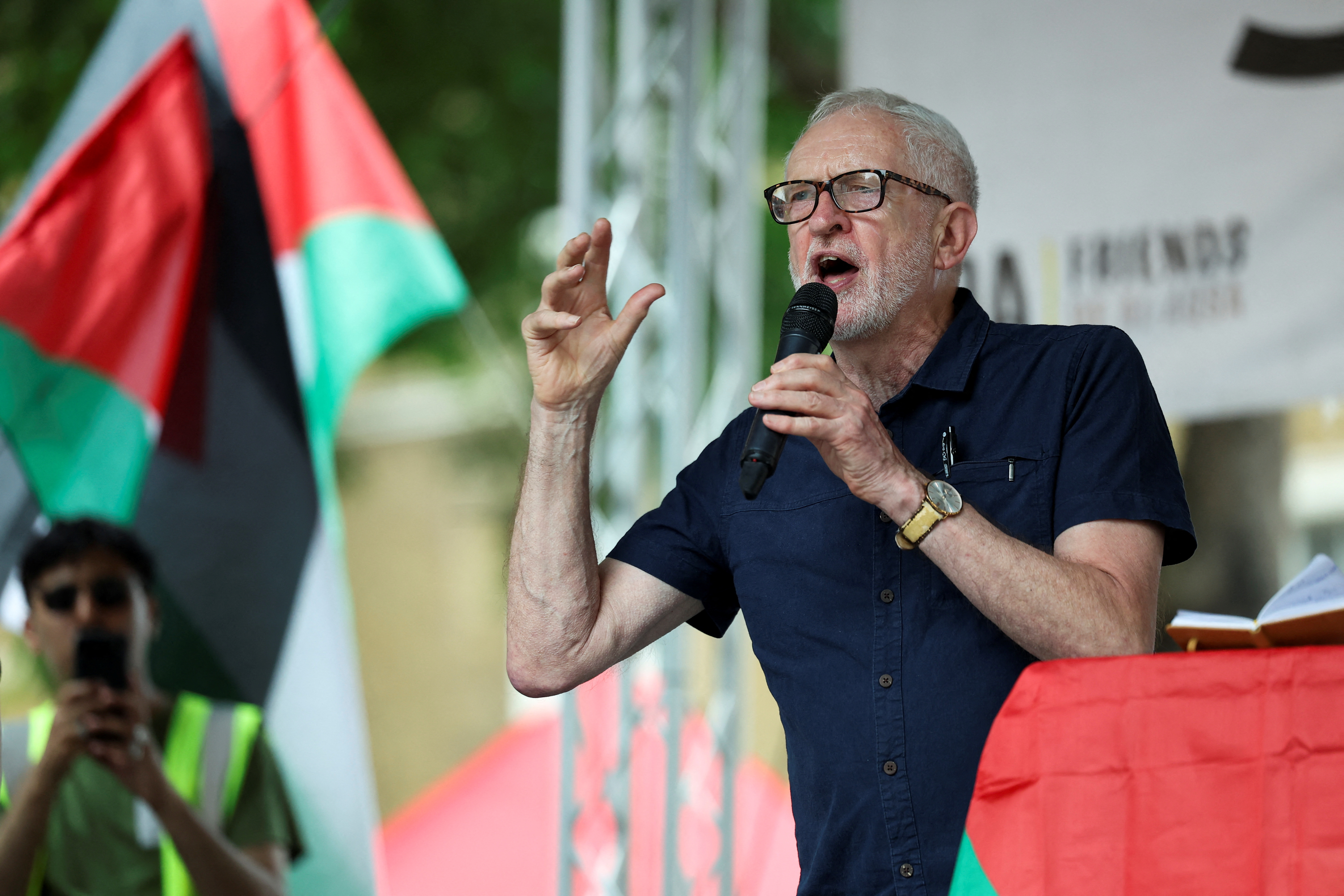 Former Labour leader Jeremy Corbyn speaks as pro-Palestinian demonstrators protest through central London, calling for the UK government to stop allowing arms exports and military co-operation with Israel, in London, Britain, June 21, 2025. REUTERS/Isabel Infantes