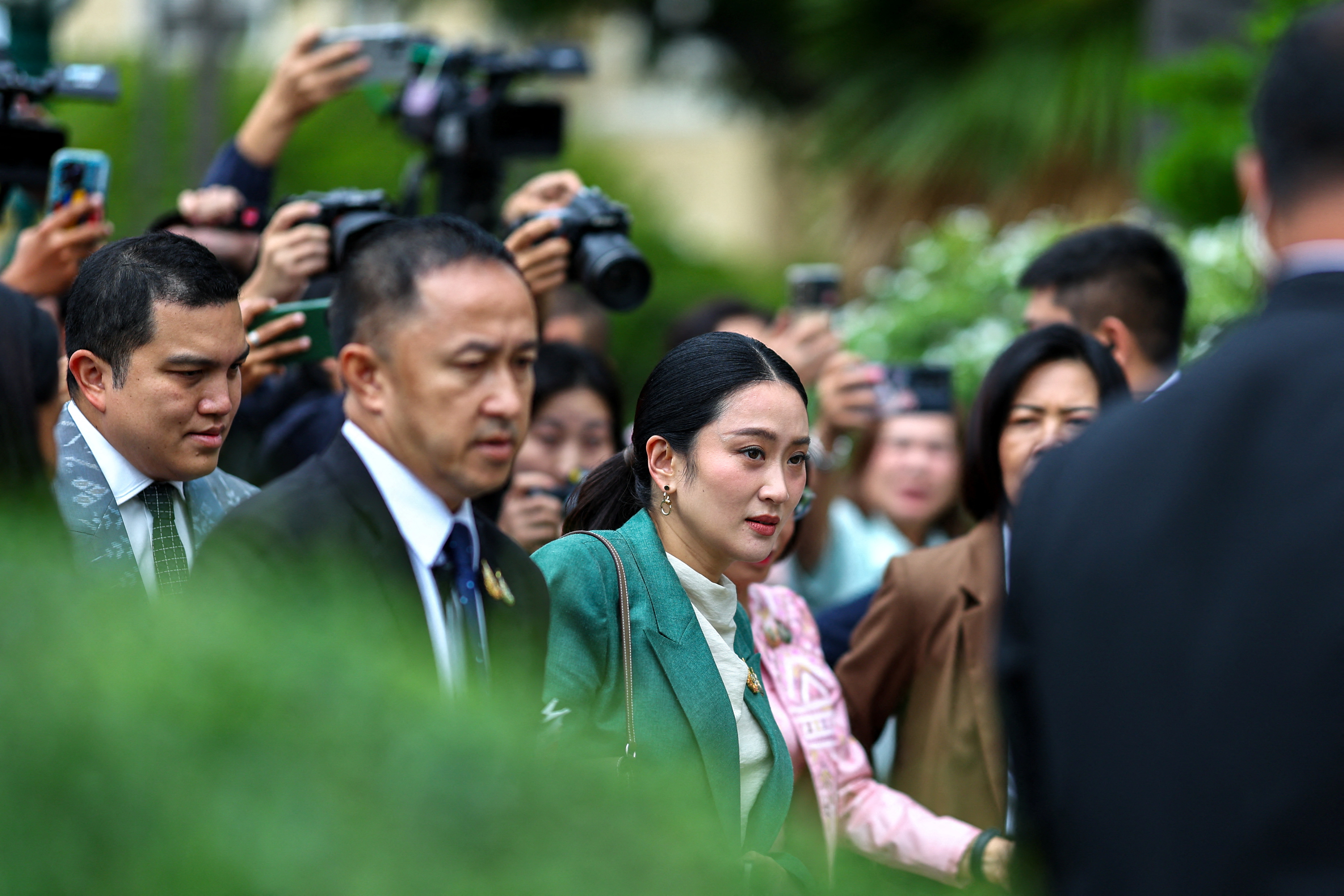 Thailand's Prime Minister Paetongtarn Shinawatra leaves after a cabinet meeting, as Thailand's Constitutional Court is expected to meet on Tuesday to consider a petition by 36 senators that accuses her of dishonesty and breaching ethnical standards in violation of the constitution over a leaked telephone conversation with Cambodia's influential former leader Hun Sen, at the Government House, in Bangkok, Thailand, July 1, 2025. REUTERS/Athit Perawongmetha