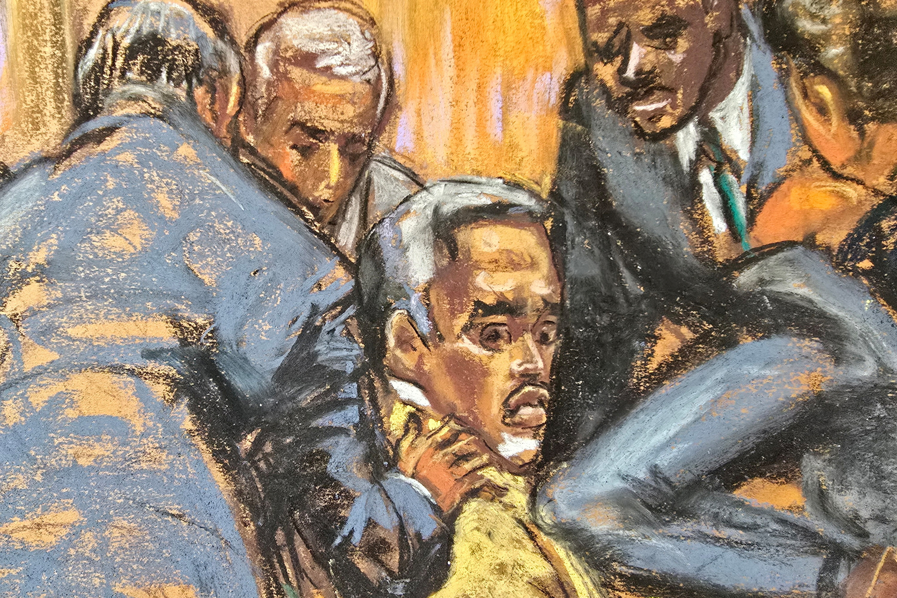 Defense lawyers comfort Sean "Diddy" Combs while discussing how to handle a note sent by jurors that they had reached a verdict on four of the five counts against him, during Combs' sex trafficking trial in New York City, New York, U.S., July 1, 2025 in this courtroom sketch. [Jane Rosenberg/Reuters]