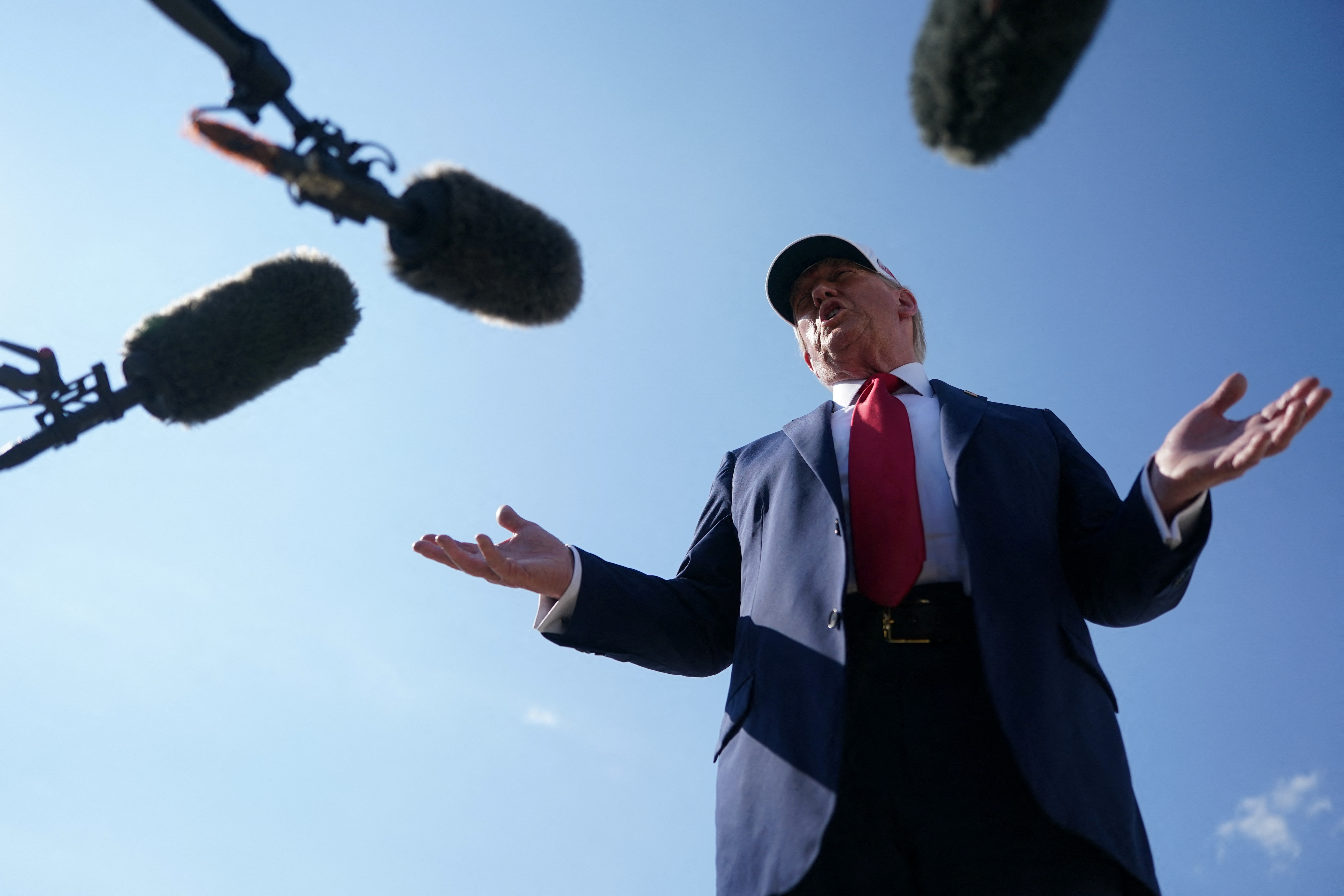 US President Donald Trump speaks to the press.