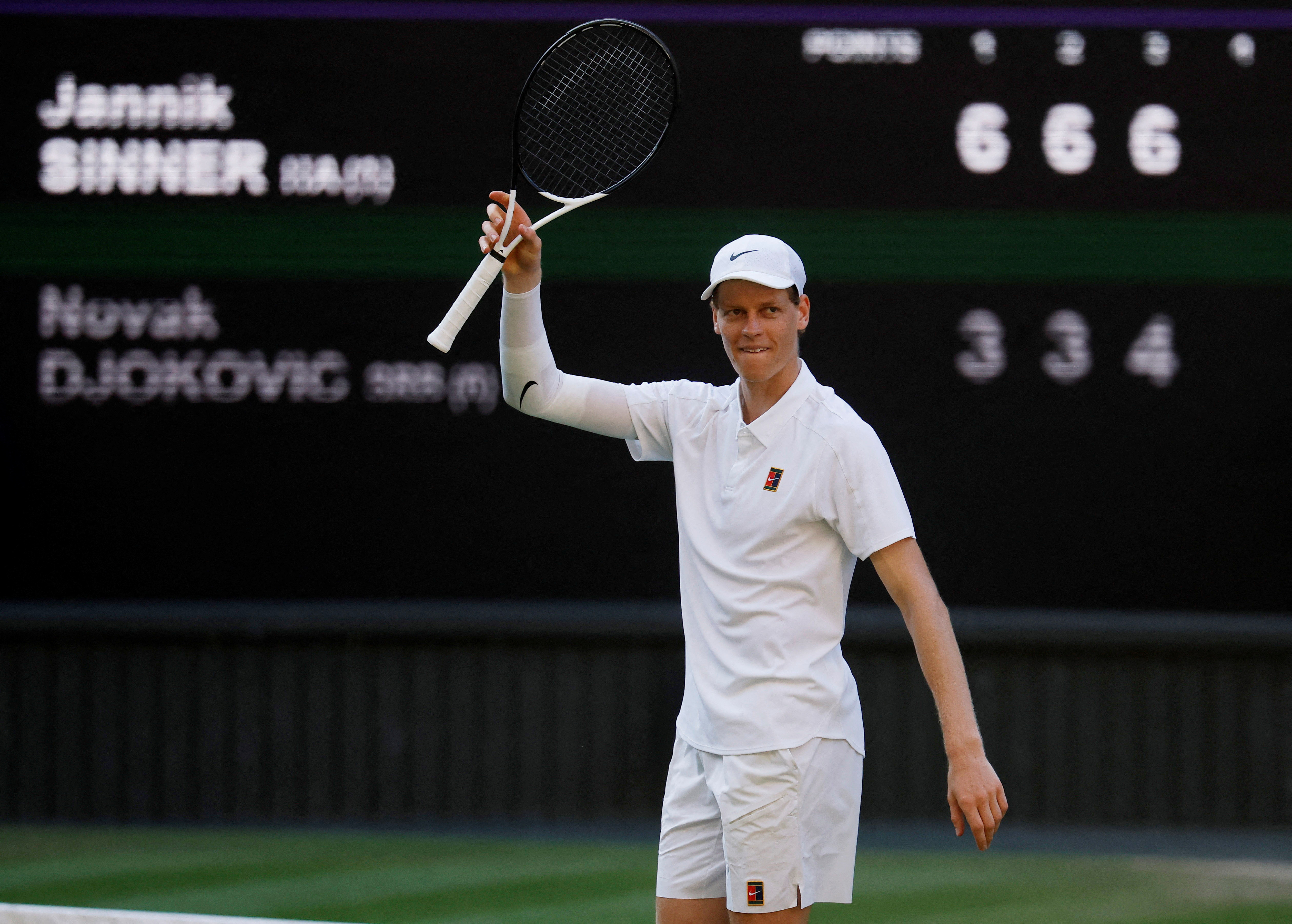 Italy's Jannik Sinner celebrates winning his semi final match against Serbia's Novak Djokovic