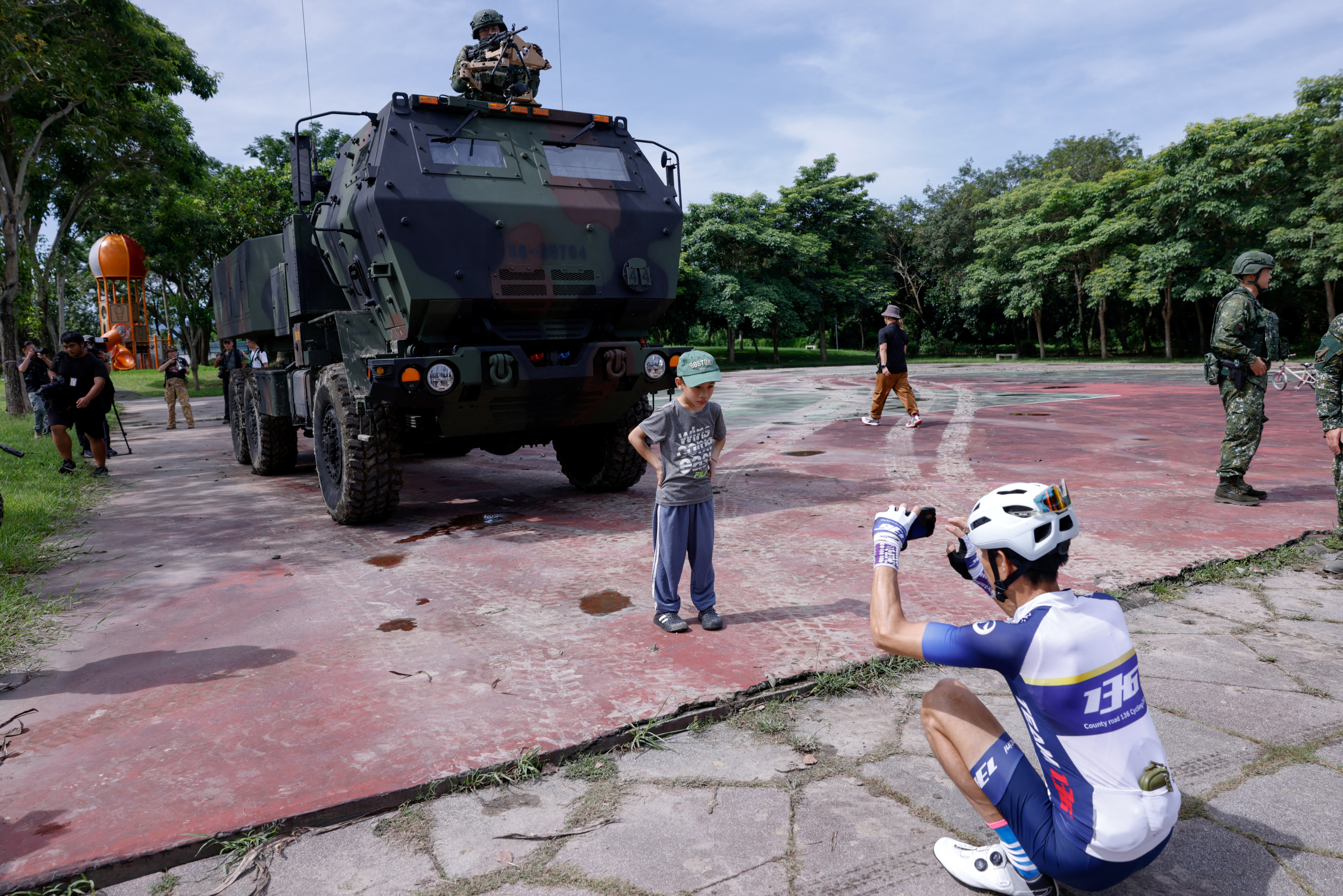 A High Mobility Artillery Rocket System (HIMARS) on display at a park.
