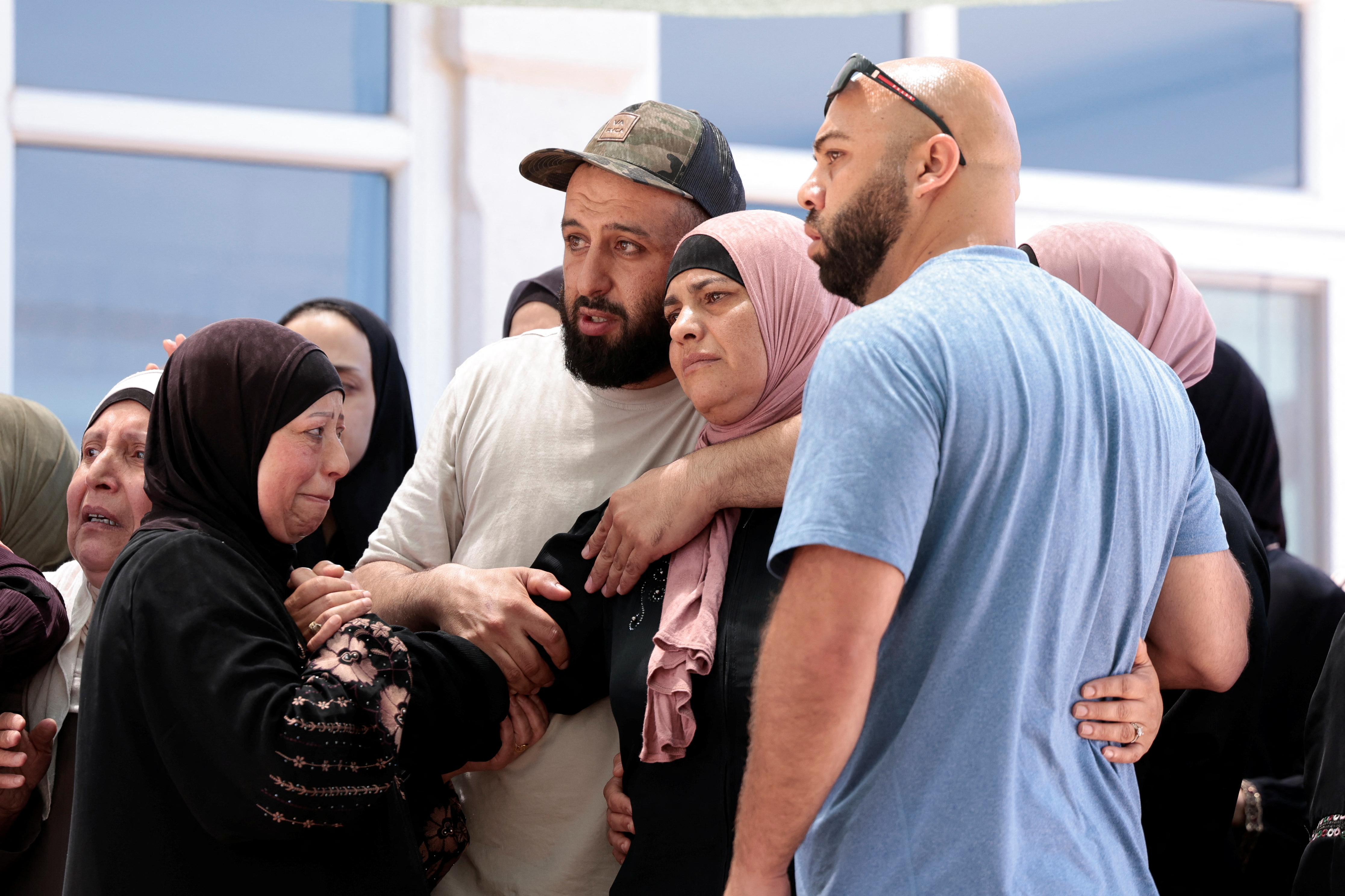 Mother of Mohammad Al-Shalabi, a man who was shot dead by Israeli forces, according to the Palestinian Health Ministry, reacts during her son's funeral near Ramallah, in the Israel-occupied West Bank