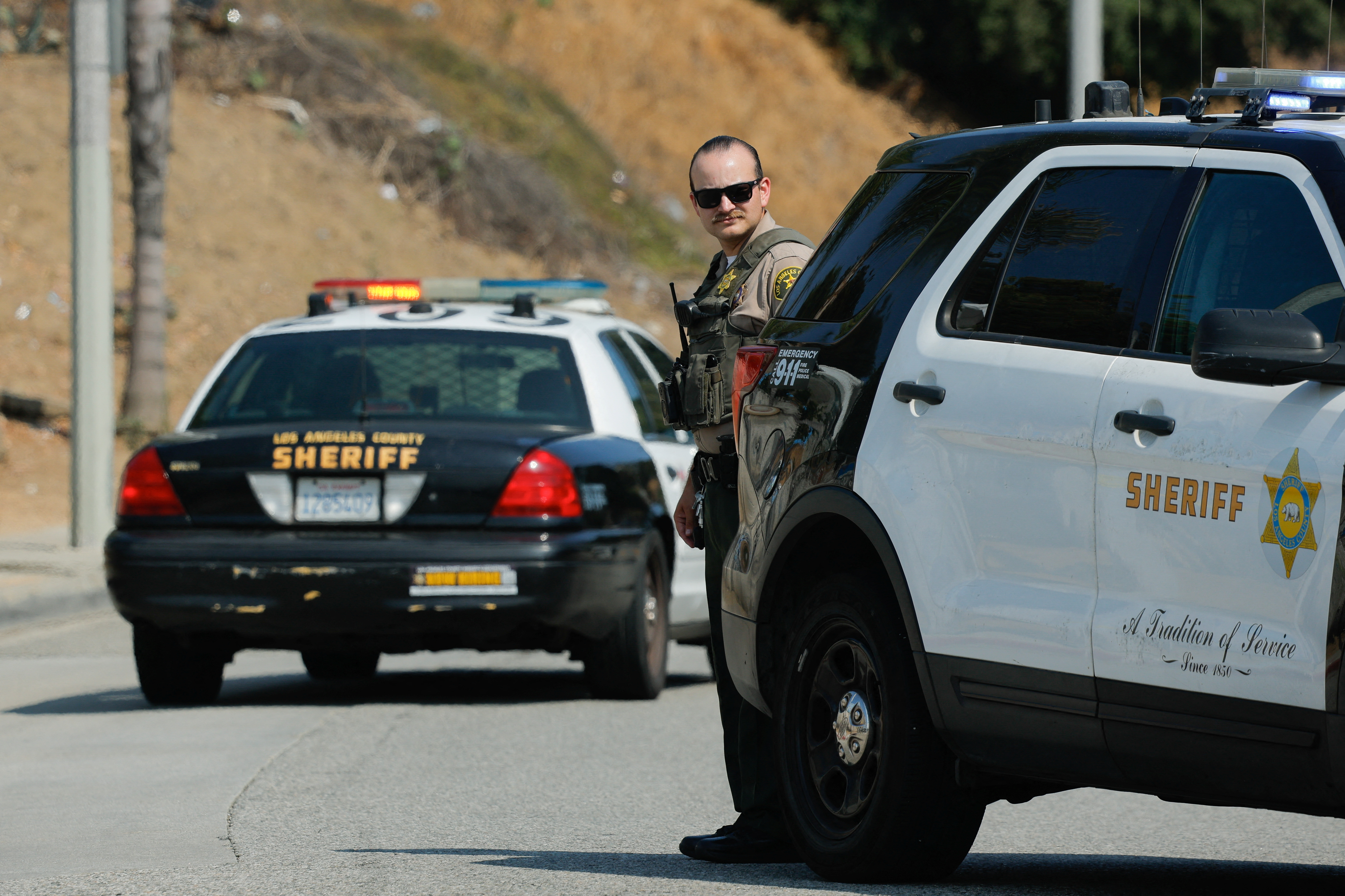 Police vehicles are outside a Los Angeles police training facility.