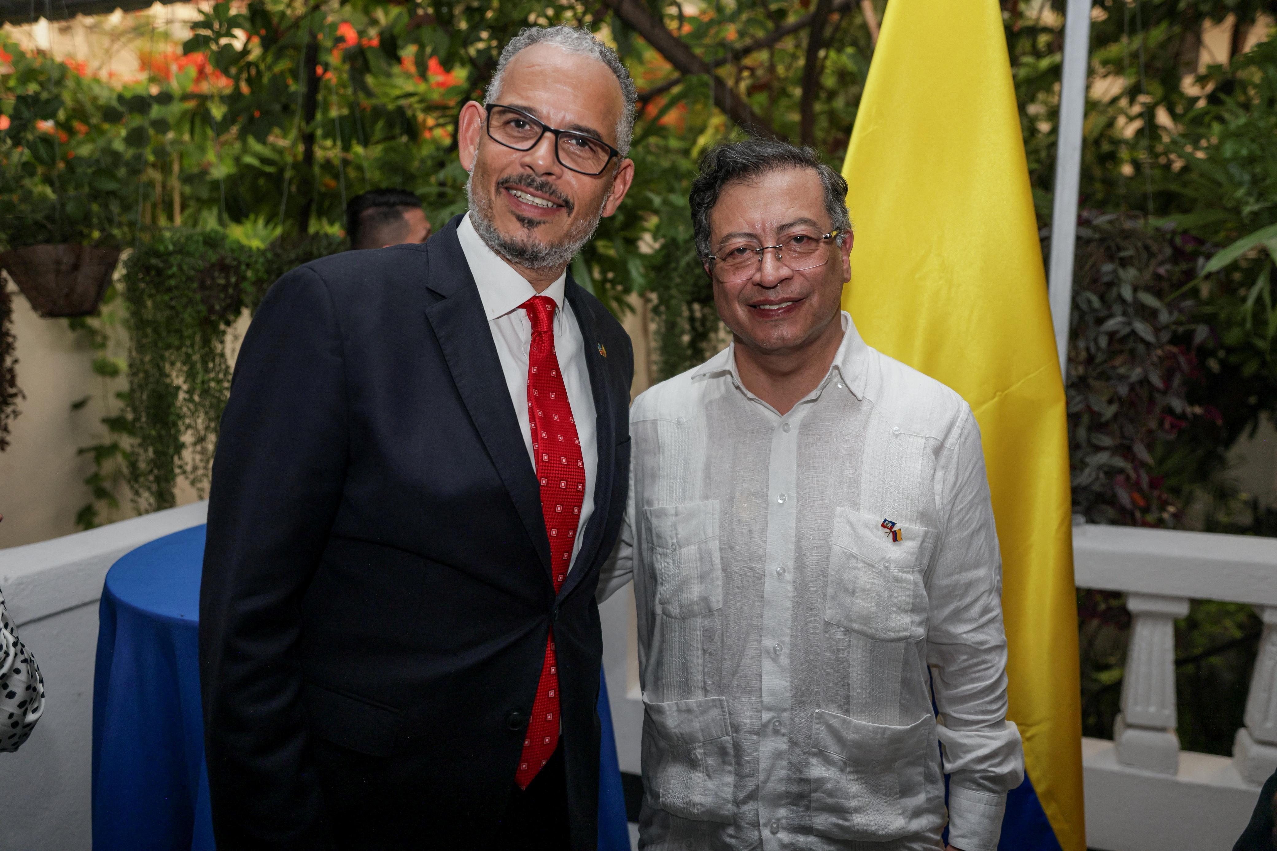 Haiti's Prime Minister Alix Didier Fils-Aime and Colombia's President Gustavo Petro pose for a photo.