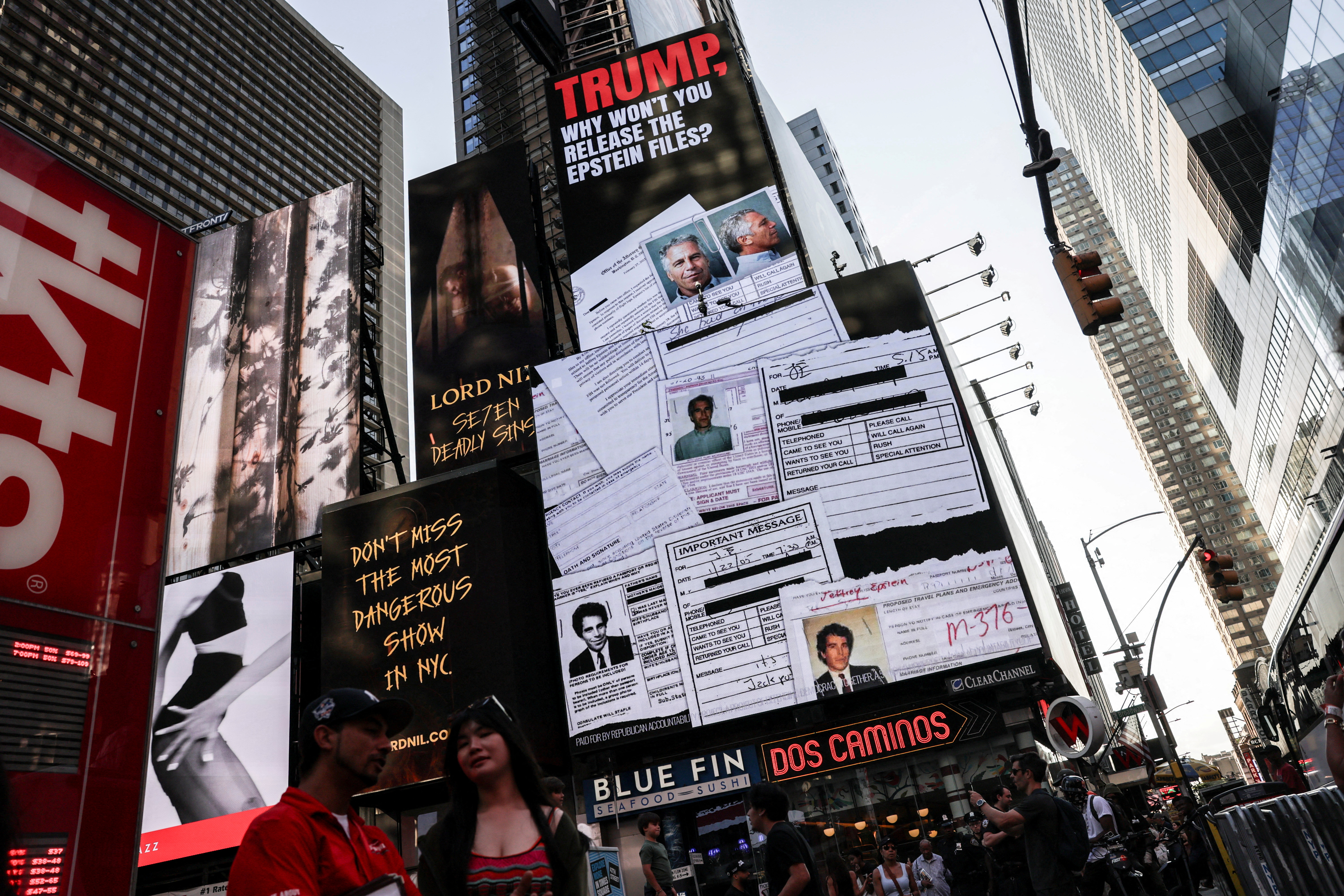 A screen about the Jeffrey Epstein files is displayed at Times Square in New York City, US, July 23, 2025. [Jeenah Moon/Reuters]