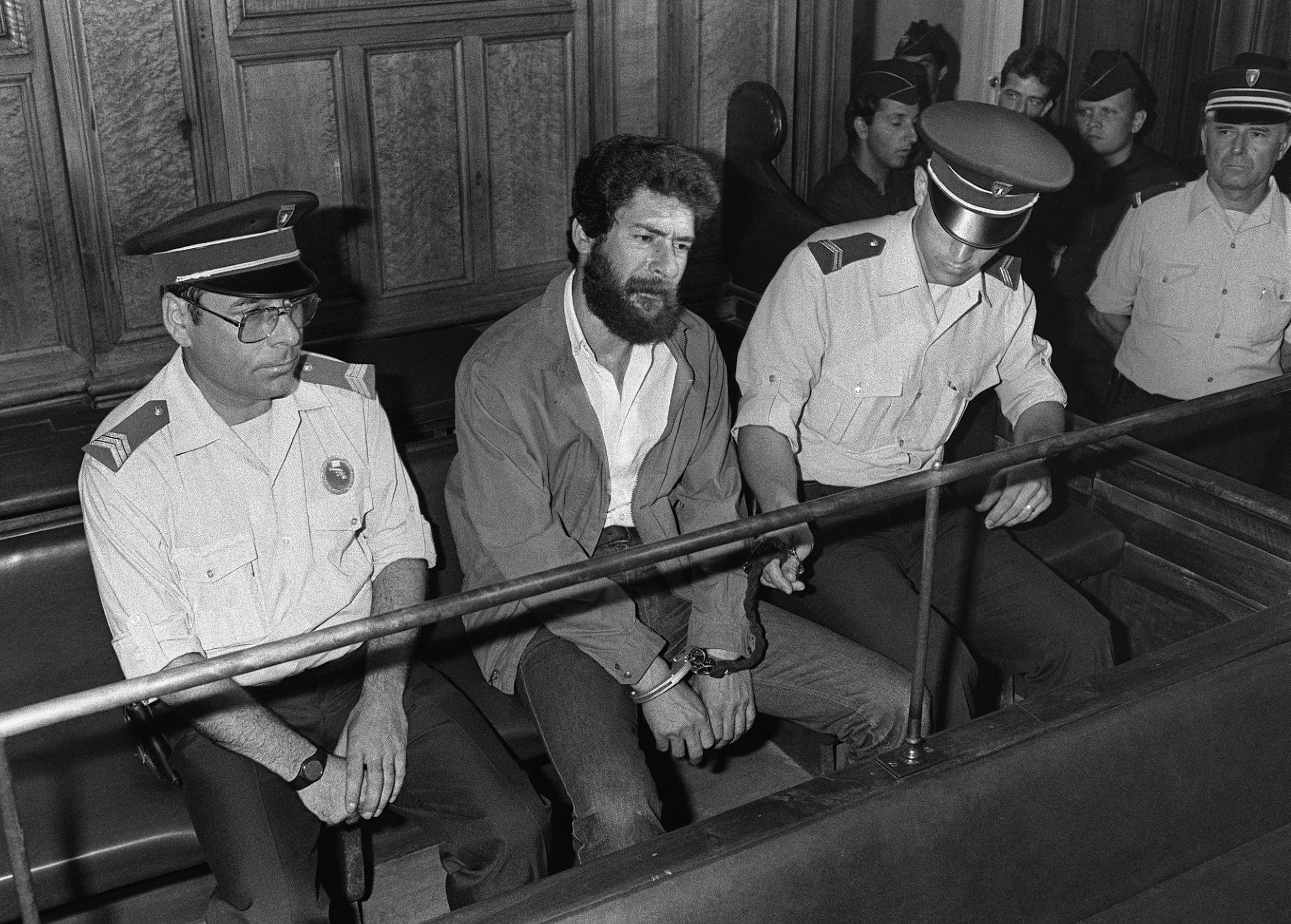 The alleged leader of the Lebanese Revolutionary Armed Forces (FARL.), Georges Ibrahim Abdallah, appeared in the dock of the Lyon Criminal Court on July 3, 1986 charged with forgery and possession of weapons.