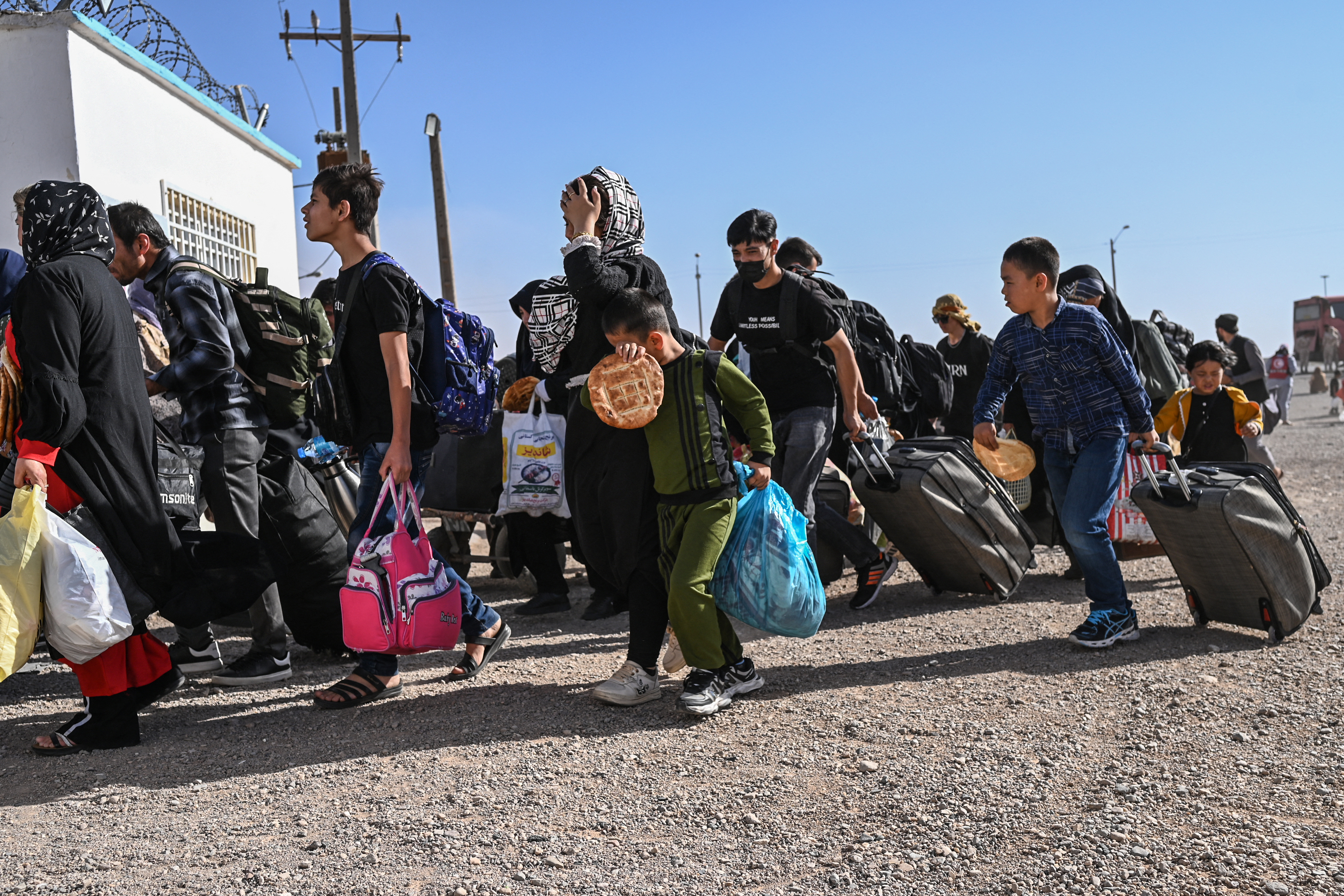 Afghan refugees arrive from Iran at Islam Qala border between Afghanistan and Iran