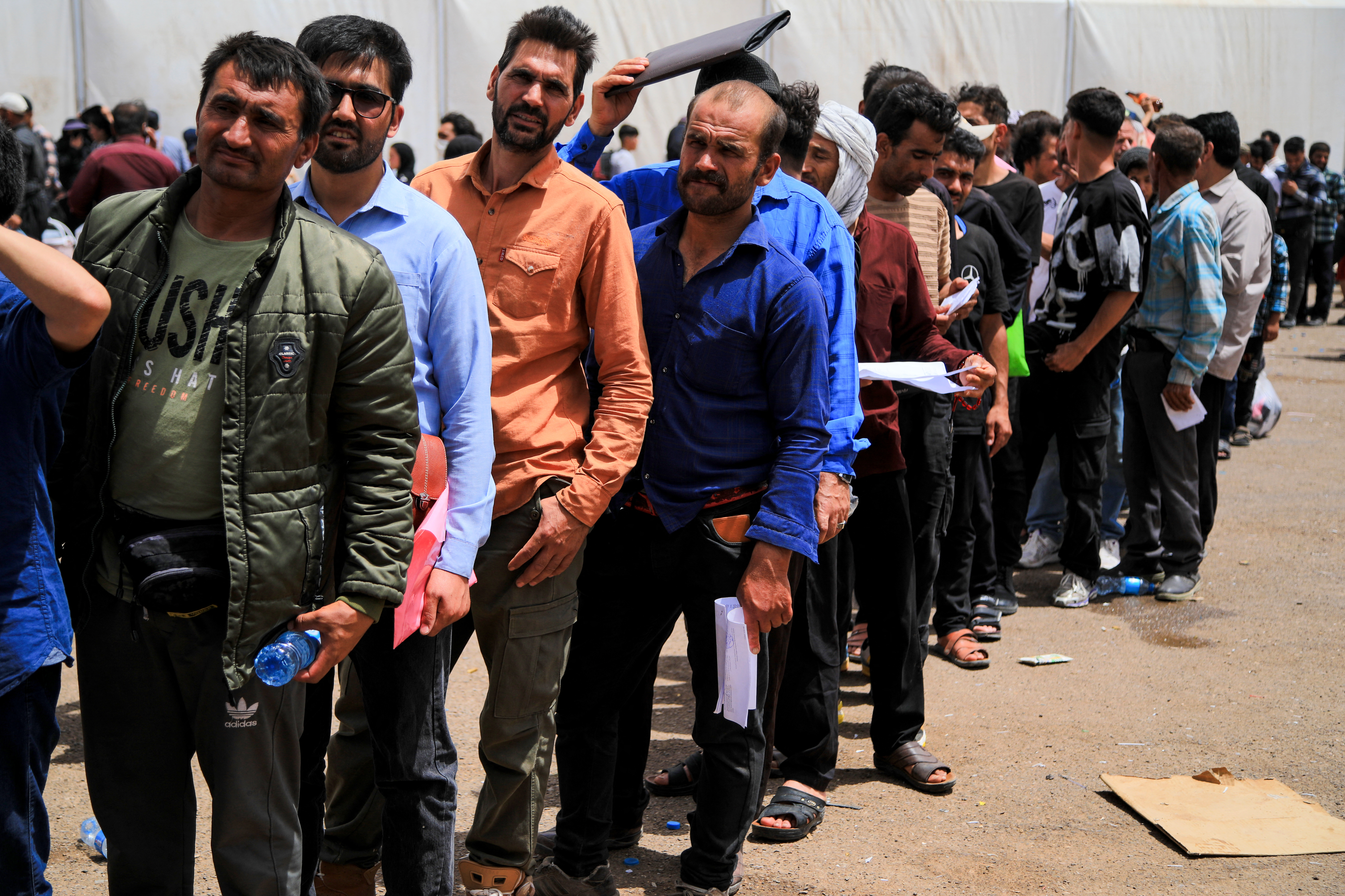 Afghan refugees arrive from Iran at Islam Qala border between Afghanistan and Iran
