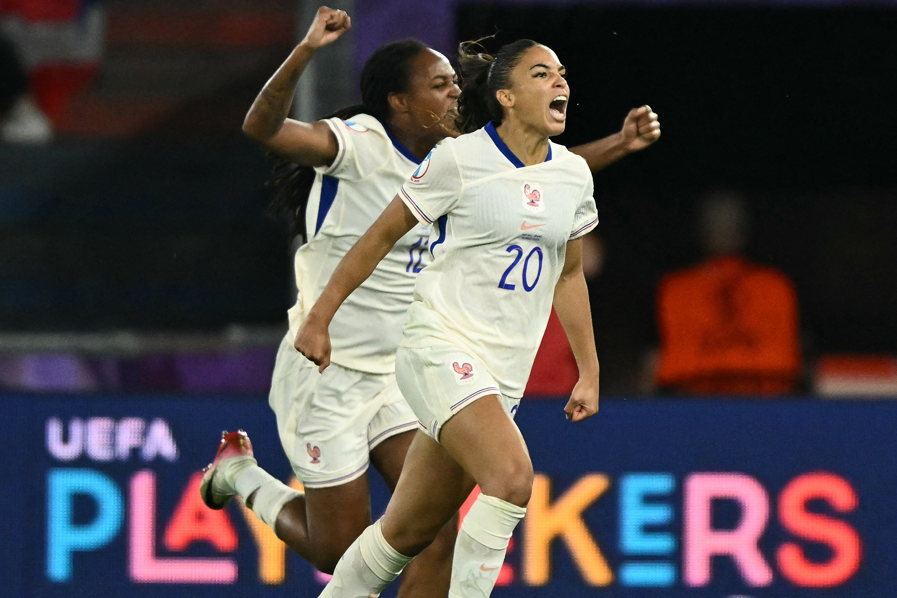 France's forward #20 Delphine Cascarino reacts.