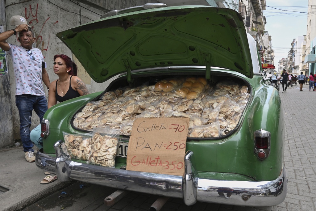 people sell products out of the back of a car
