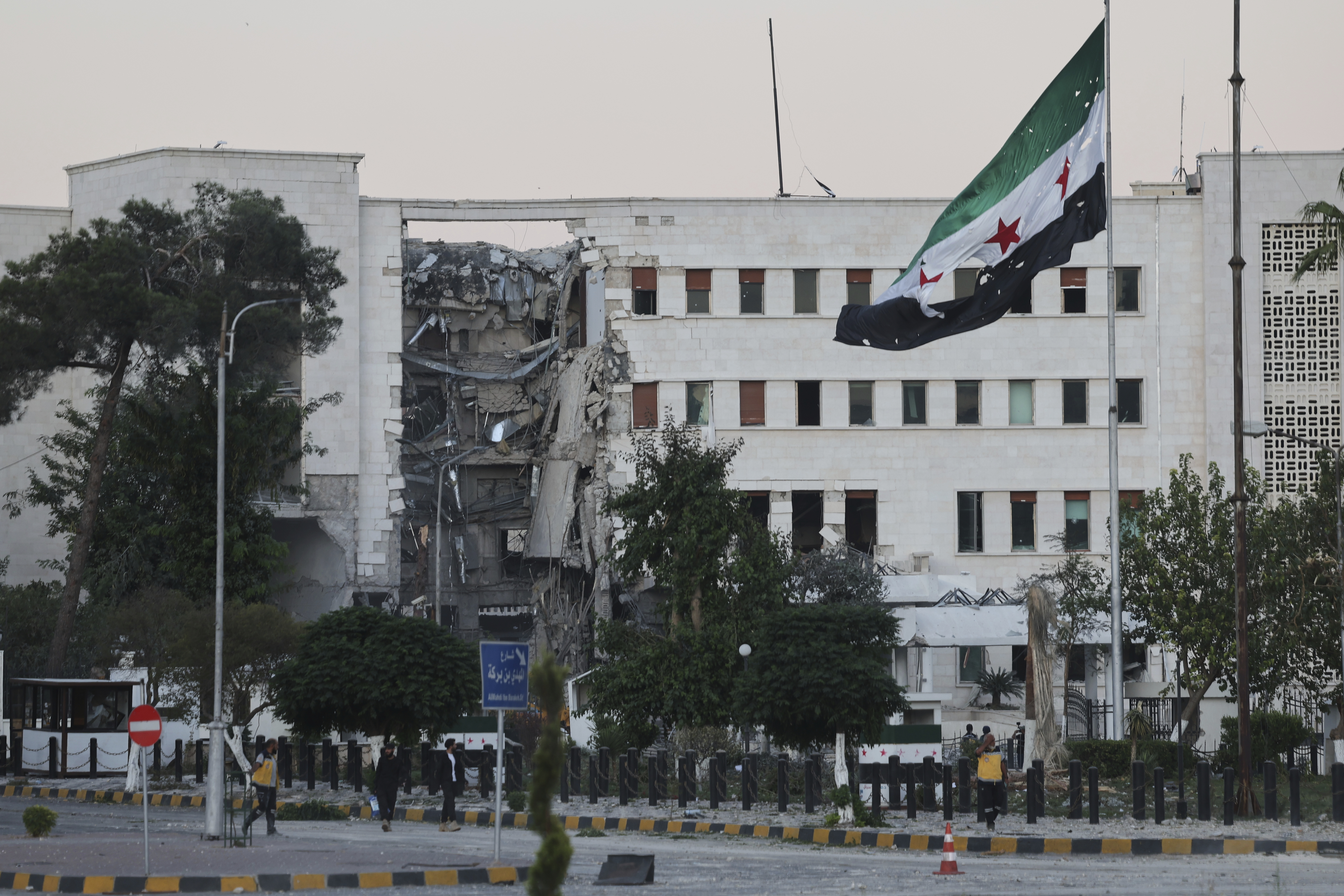 The Syrian Defence Ministry building sits heavily damaged.