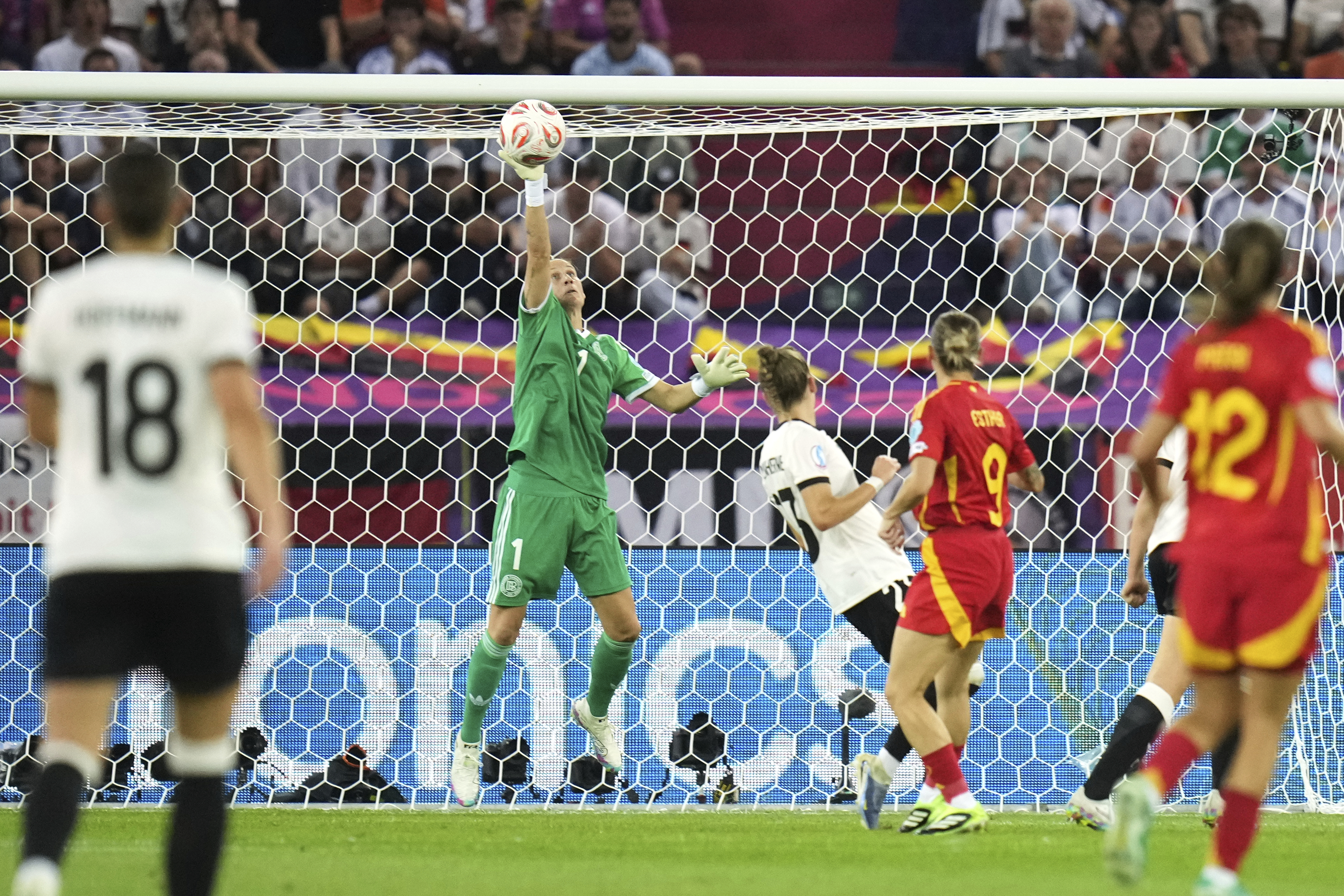 Germany goalkeeper Ann-Katrin Berger saves a shot from Spain's Esther Gonzalez during the Women's Euro 2025 semifinals