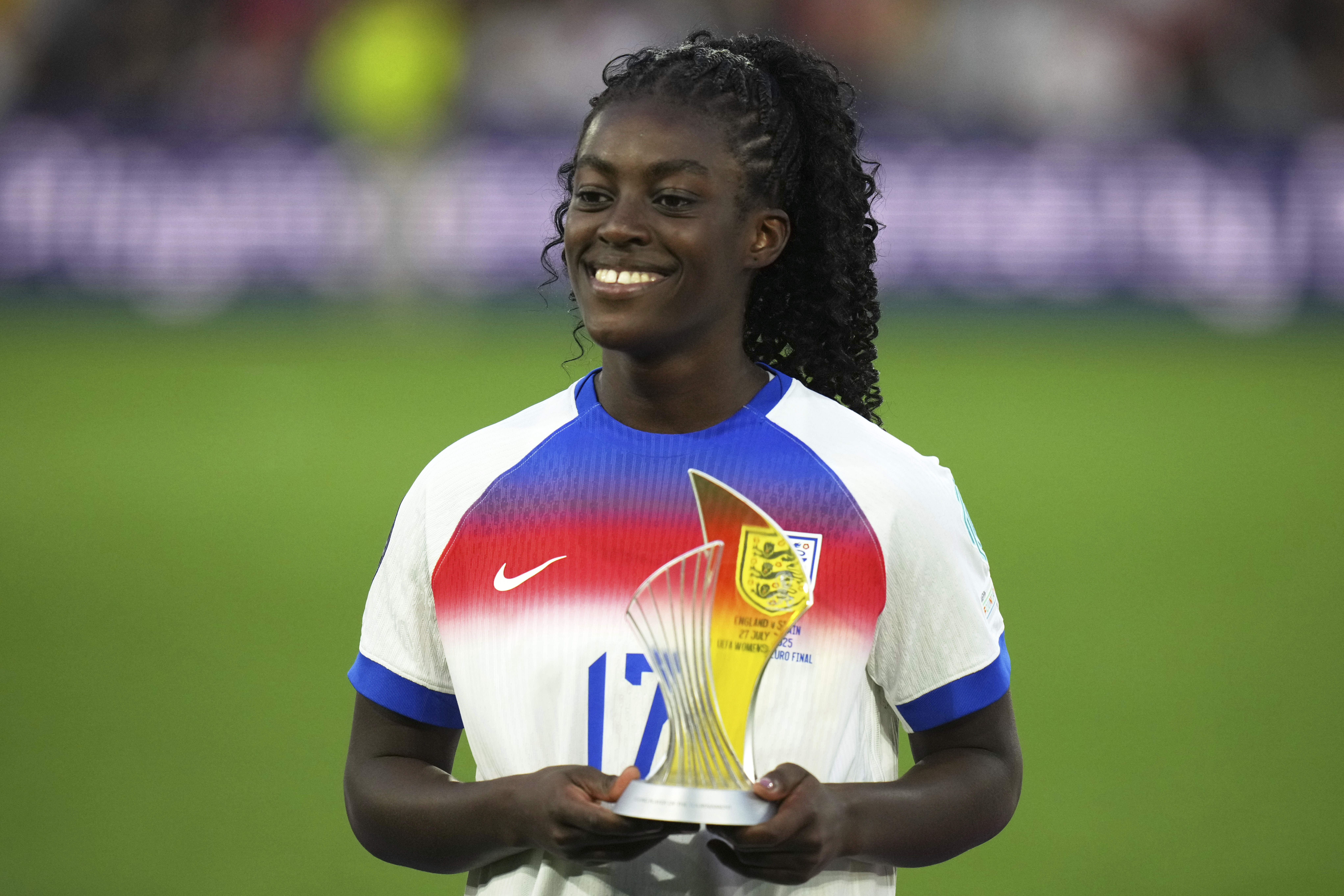 England's Michelle Agyemang poses with the "Best Young Player" of the tournament award at the end of the Women's Euro 2025 final soccer match between England and Spain at St. Jakob-Park in Basel, Switzerland, Sunday, July 27, 2025. (AP Photo/Alessandra Tarantino)