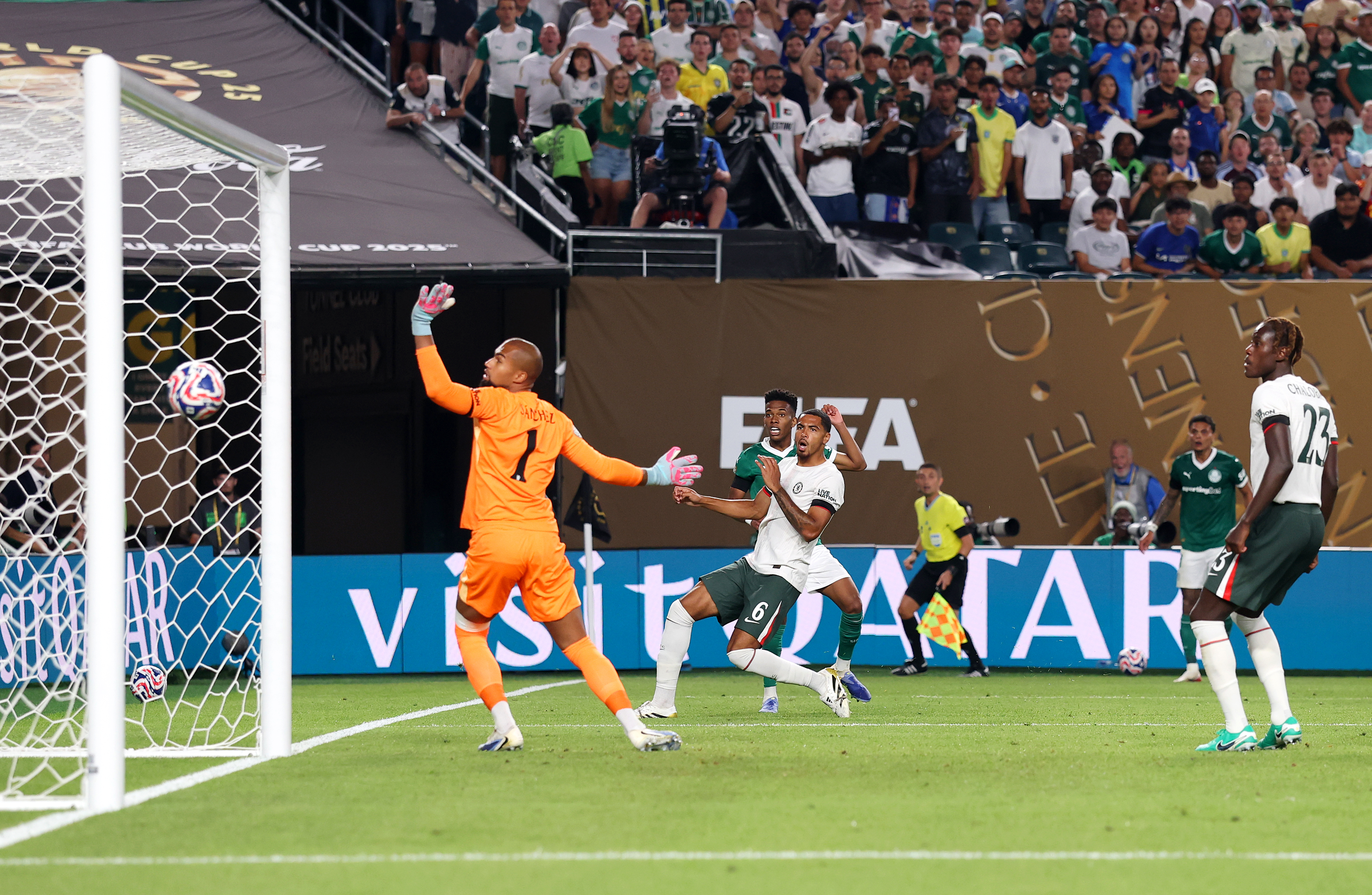 Estevao #41 of Palmeiras scores his team's first goal past Robert Sanchez #1 of Chelsea