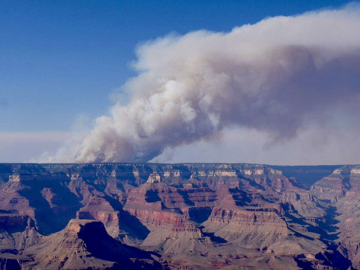 Smoke billows over the Grand Canyon, Arizona, U.S., in this image released on July 11, 2025, obtained from social media. NPS Photo/M. Quinn via REUTERS THIS IMAGE HAS BEEN SUPPLIED BY A THIRD PARTY. MANDATORY CREDIT. NO RESALES. NO ARCHIVES.