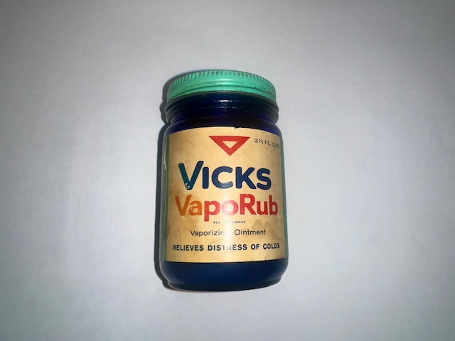 Vicks VapoRub glass jar.