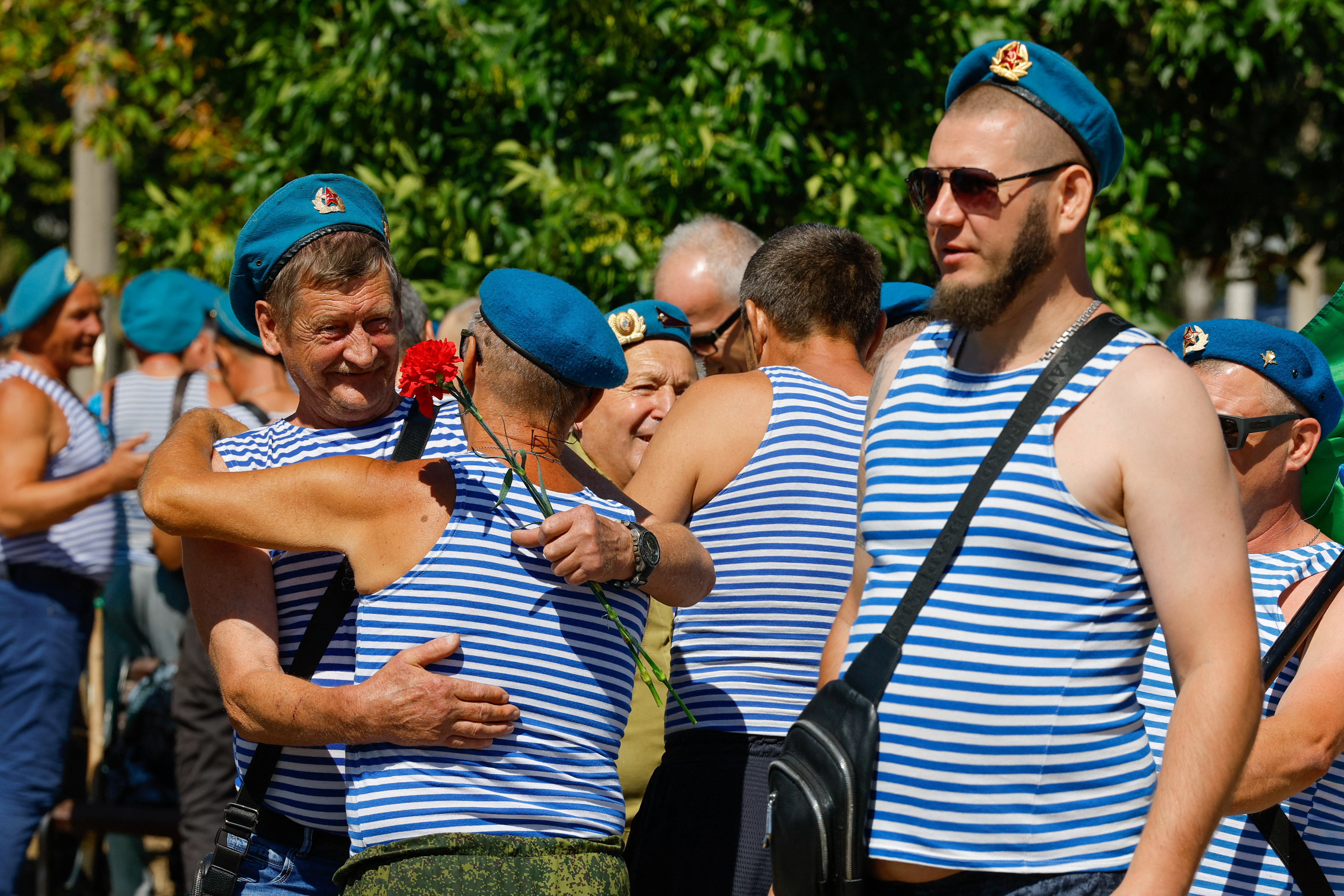 Former service members gather to celebrate the Paratroopers' Day, the annual holiday of Russia's Airborne Troops, in Donetsk, Russian-controlled part of Ukraine, August 2, 2025. REUTERS/Alexander Ermochenko
