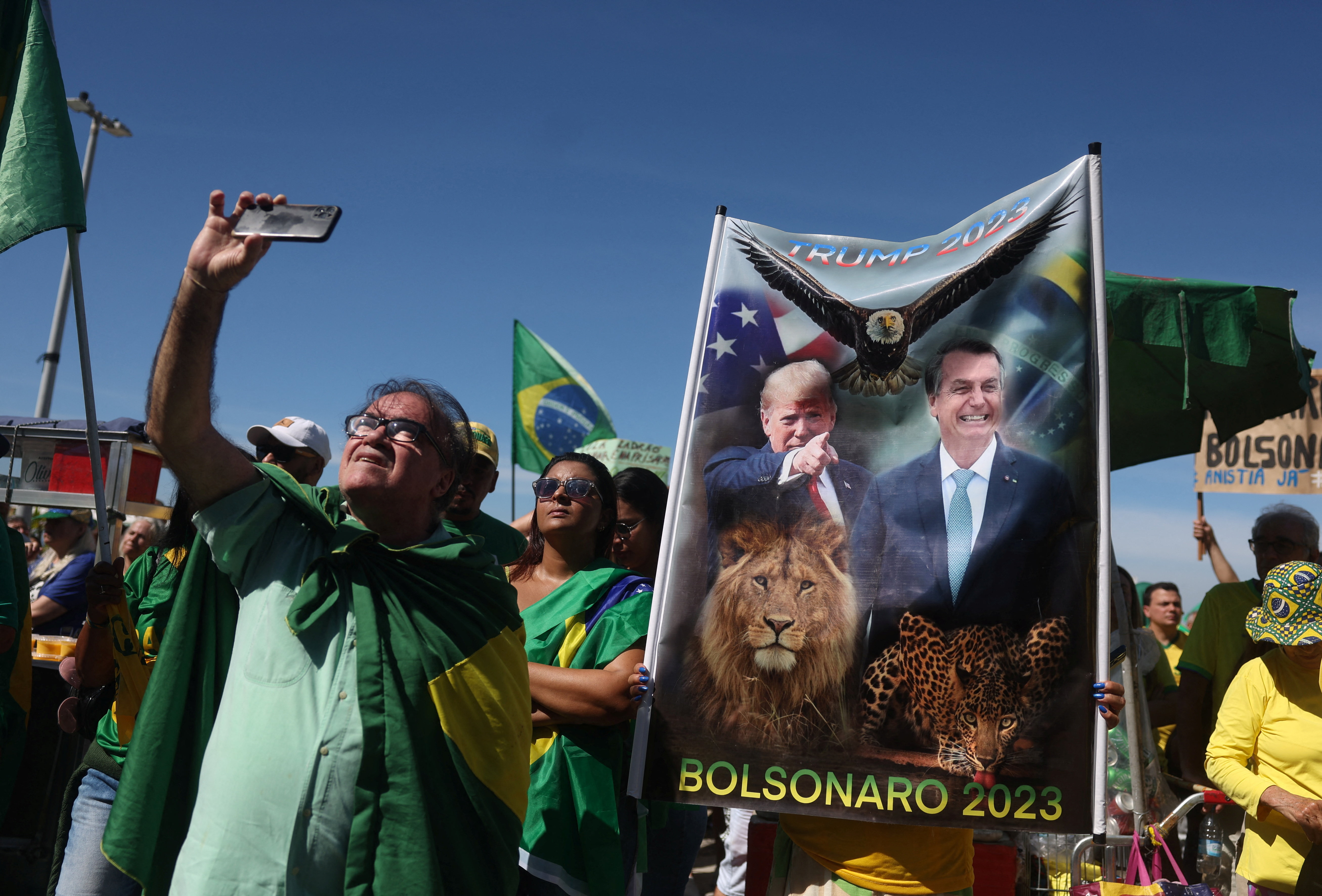 upporters of former Brazilian President Jair Bolsonaro hold a rally