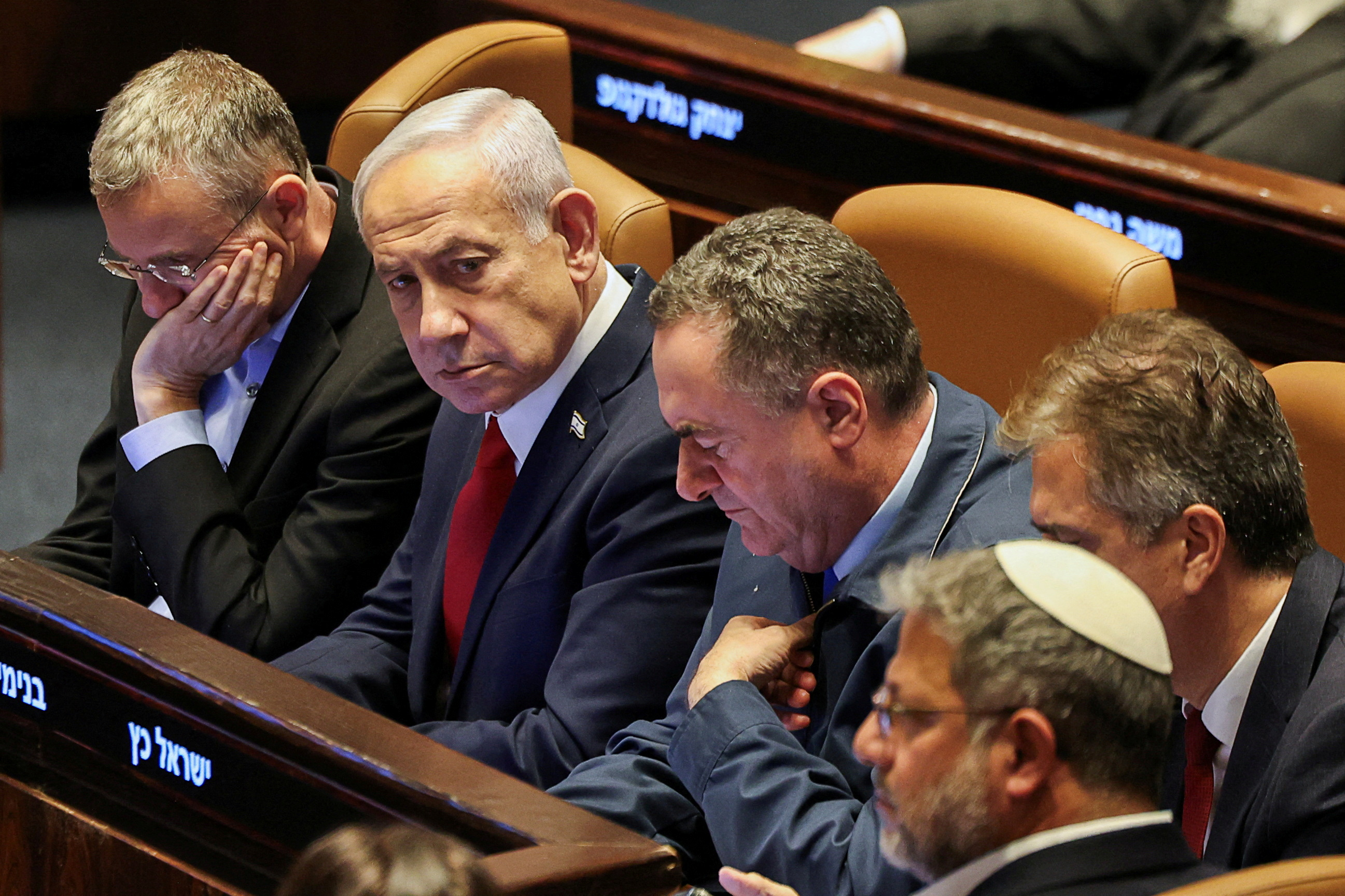 Israeli Prime Minister Benjamin Netanyahu attends a discussion at the plenum in the Knesset, Israel's parliament, in Jerusalem in July. In an interview with Fox News Thursday he confirmed his intention that Israel takes control of all of Gaza. [File: Ronen Zvulun/Reuters]