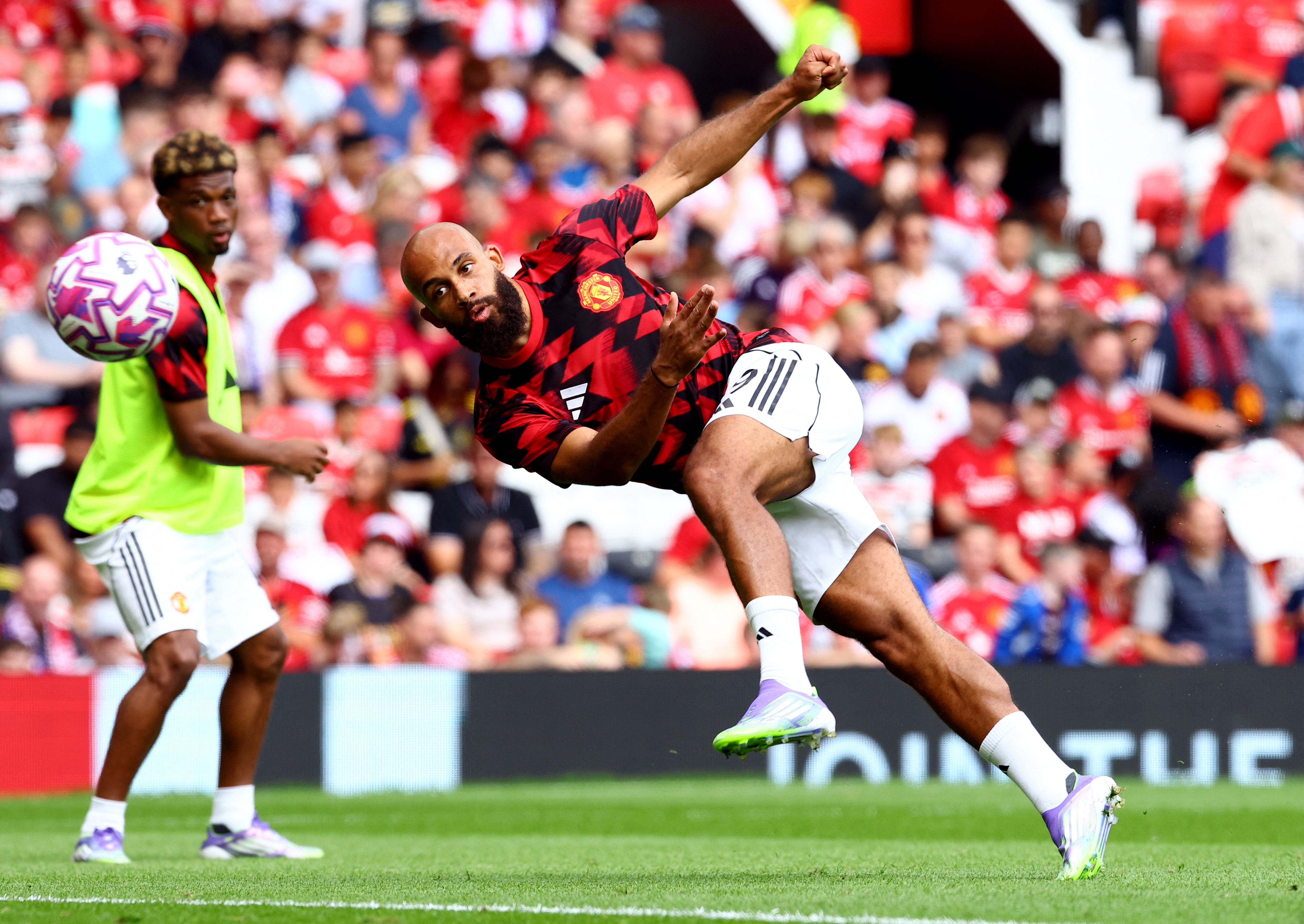 Manchester United's Bryan Mbeumo during the warm up before the match 