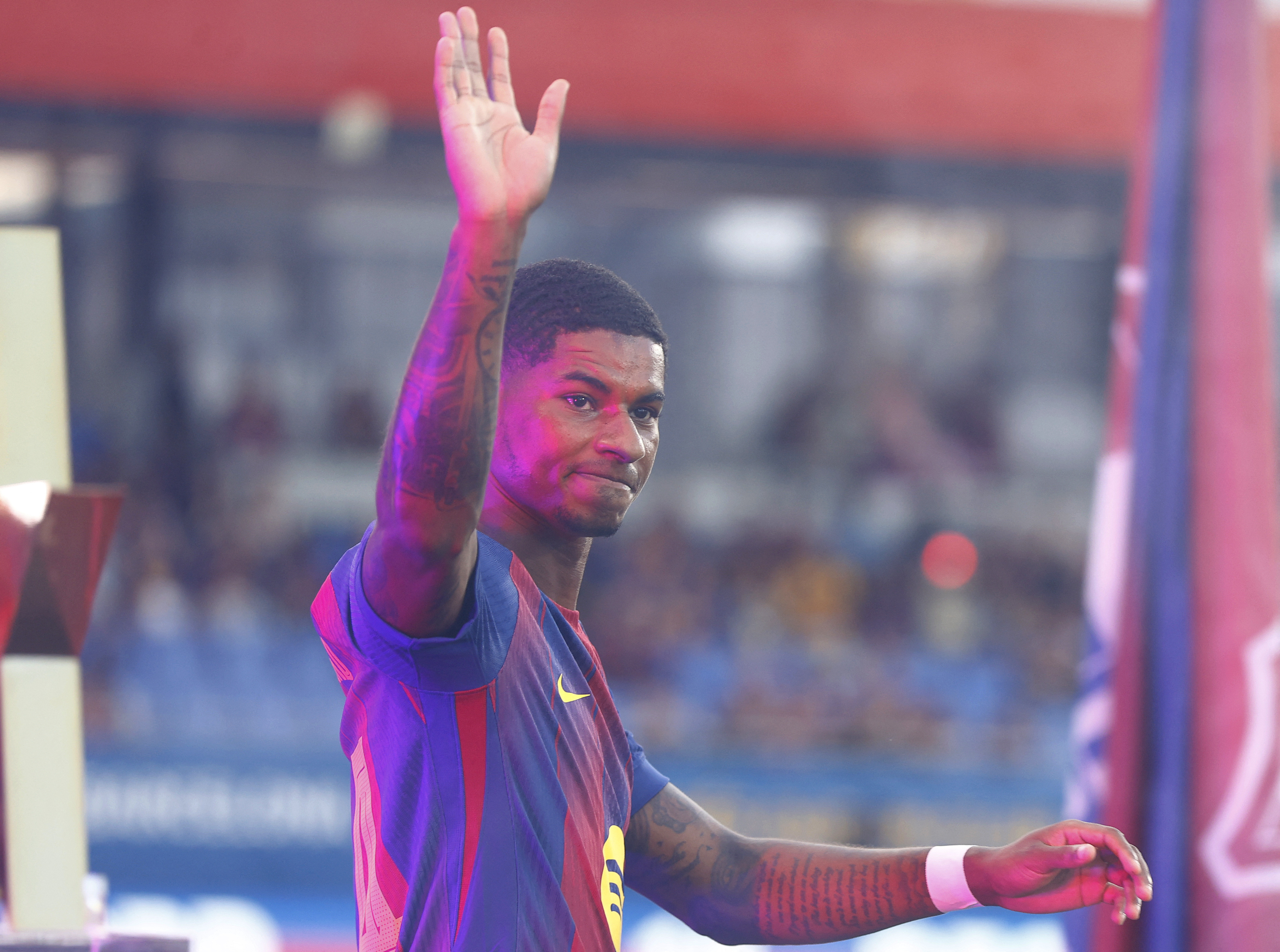 Barcelona's Marcus Rashford acknowledges fans before the match against Como