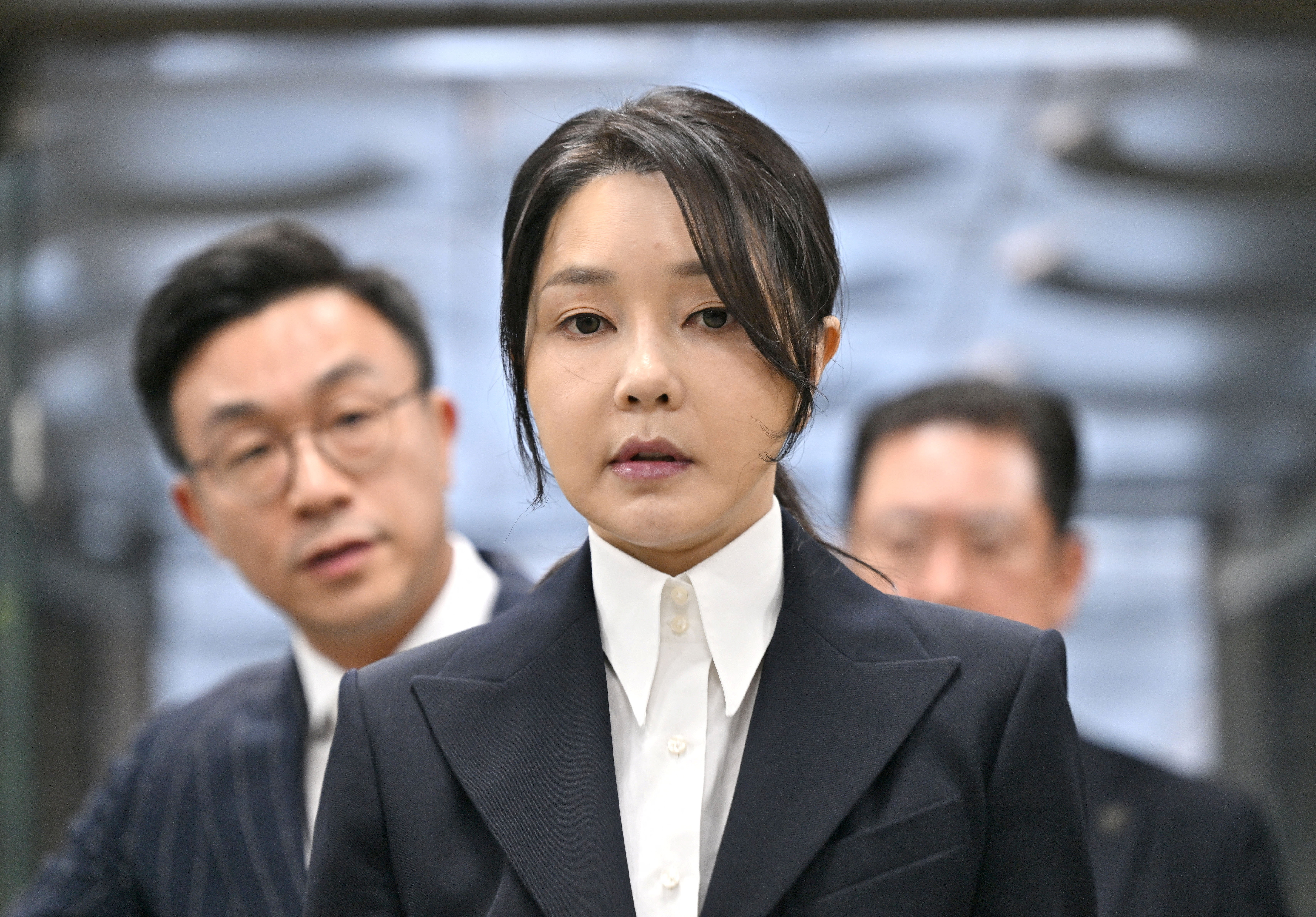 South Korea's former first lady Kim Keon Hee, wife of impeached former president Yoon Suk Yeol, arrives at a court to attend a hearing to review her arrest warrant requested by special prosecutors at the Seoul Central District Court, in Seoul, South Korea August 12, 2025. JUNG YEON-JE/Pool via REUTERS