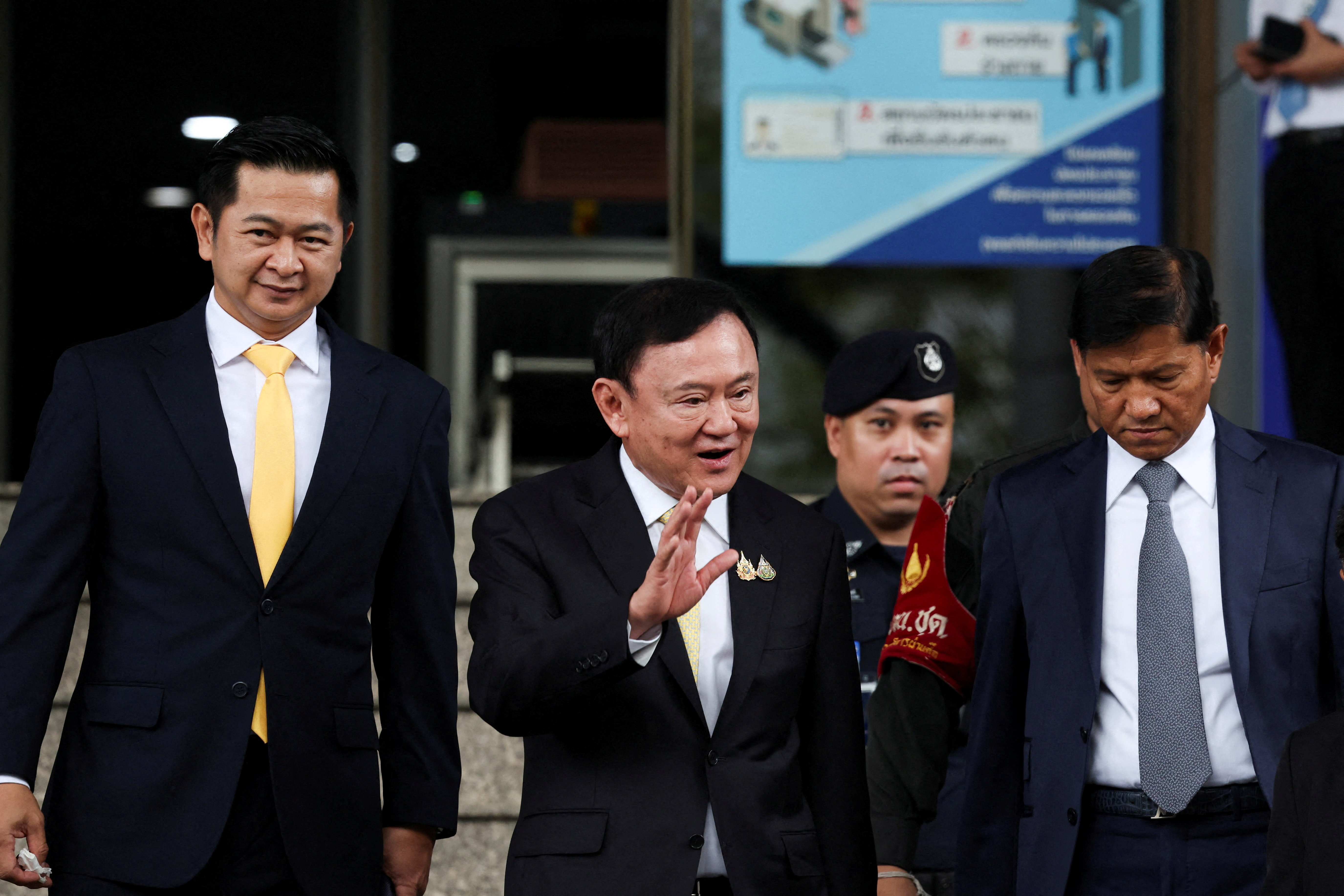 Former Thai Prime Minister Thaksin Shinawatra leaves after a Thai criminal court cleared him of charges in a lese majeste case, also known as a royal insult case, under Section 112 of Thailand's Criminal Code, stemming from a 2015 interview he gave while in South Korea during his long stint in self-imposed exile, in Bangkok, Thailand, August 22, 2025. REUTERS/Chalinee Thirasupa TPX IMAGES OF THE DAY
