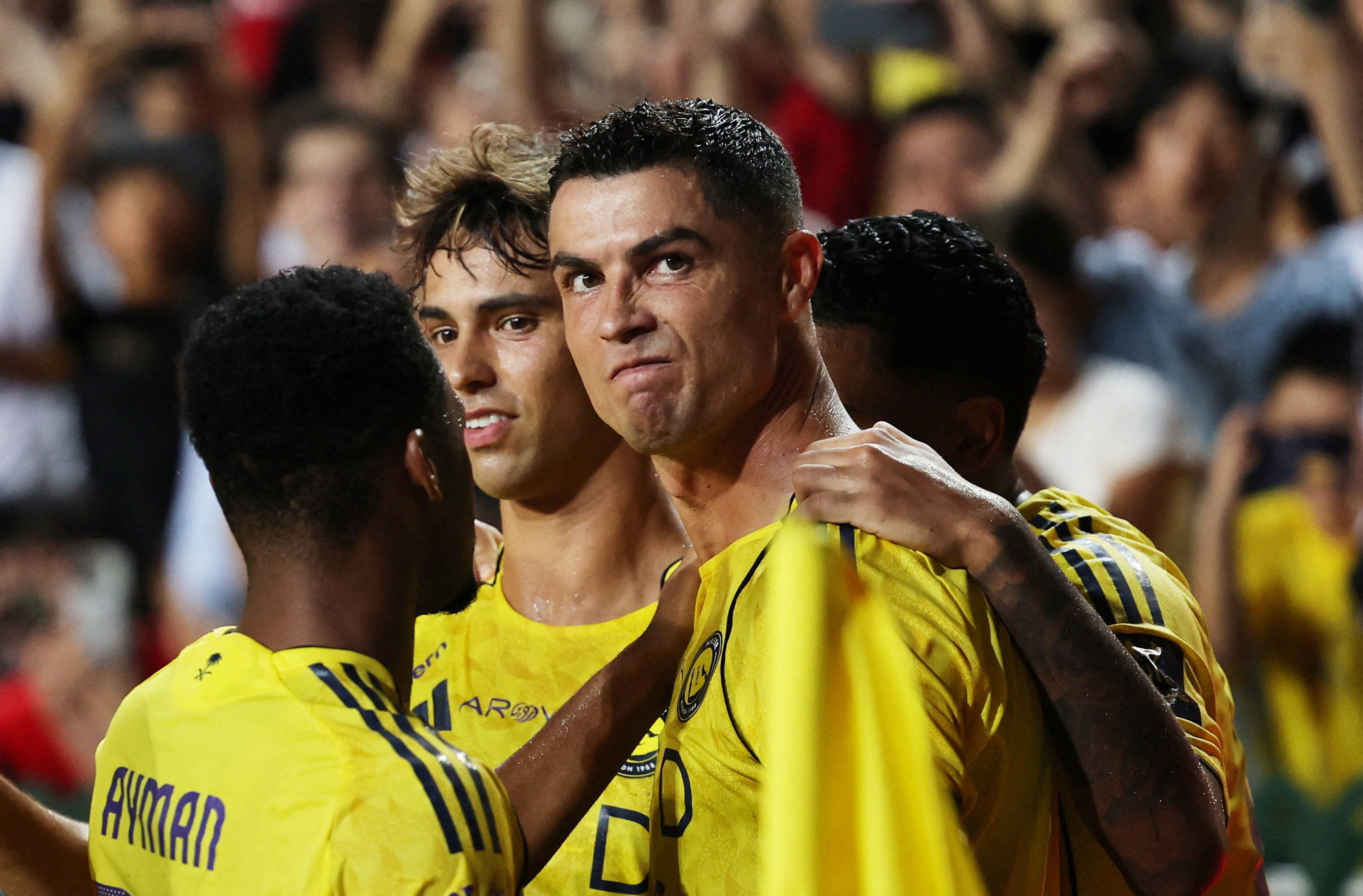 Al Nassr's Cristiano Ronaldo celebrates scoring their first goal against Al Hilal in the Saudi Super Cup