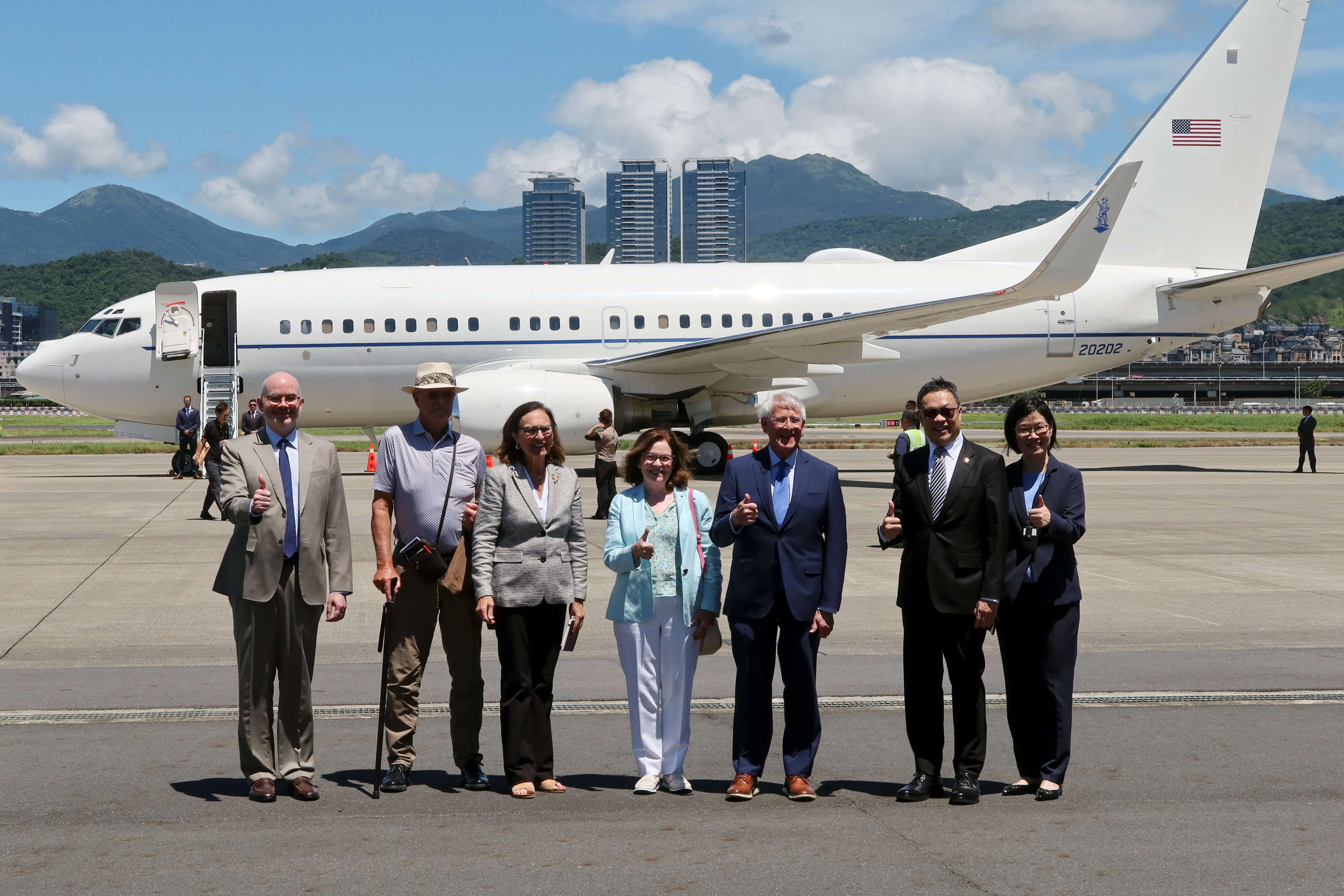 US Senator Roger Wicker poses for pictures alongside US Senator Deb Fischer and others upon arriving at the Songshan Airport in Taipei.