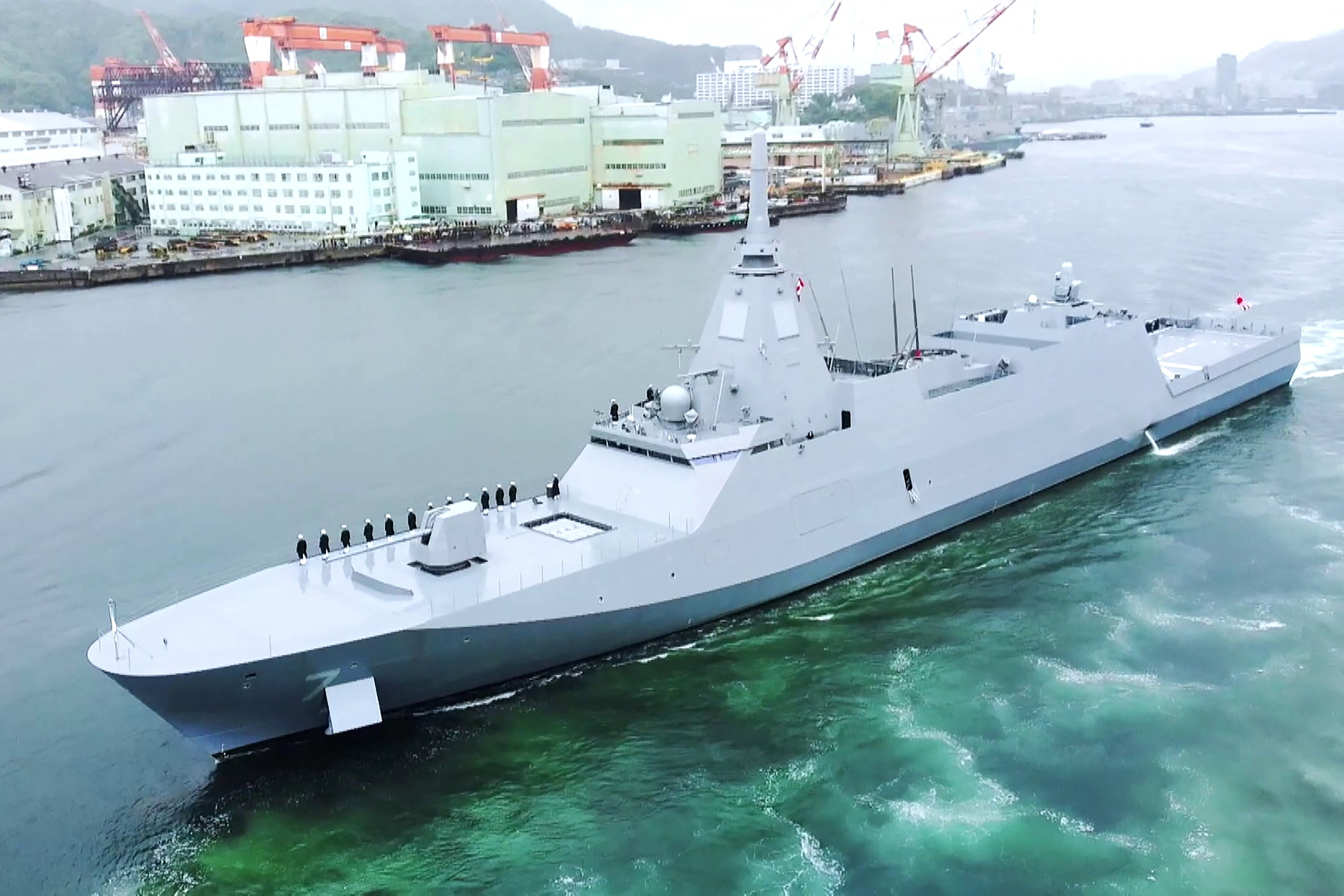 This undated handout photo released by the Australian Defence Force on August 5, 2025 shows a Japanese Maritime Self-Defence Force (JMSDF) Mogami-class frigate JS Niyodo (FFM-7) sailing in an undisclosed location. Australia will upgrade its navy with 11 Mogami-class frigates built by Japan's Mitsubishi Heavy Industries, Defence Minister Richard Marles said on August 5, 2025. (Photo by Handout / AUSTRALIAN DEFENCE FORCE / AFP) / RESTRICTED TO EDITORIAL USE - MANDATORY CREDIT "AFP PHOTO / AUSTRALIAN DEFENCE FORCE" - NO MARKETING - NO ADVERTISING CAMPAIGNS - DISTRIBUTED AS A SERVICE TO CLIENTS