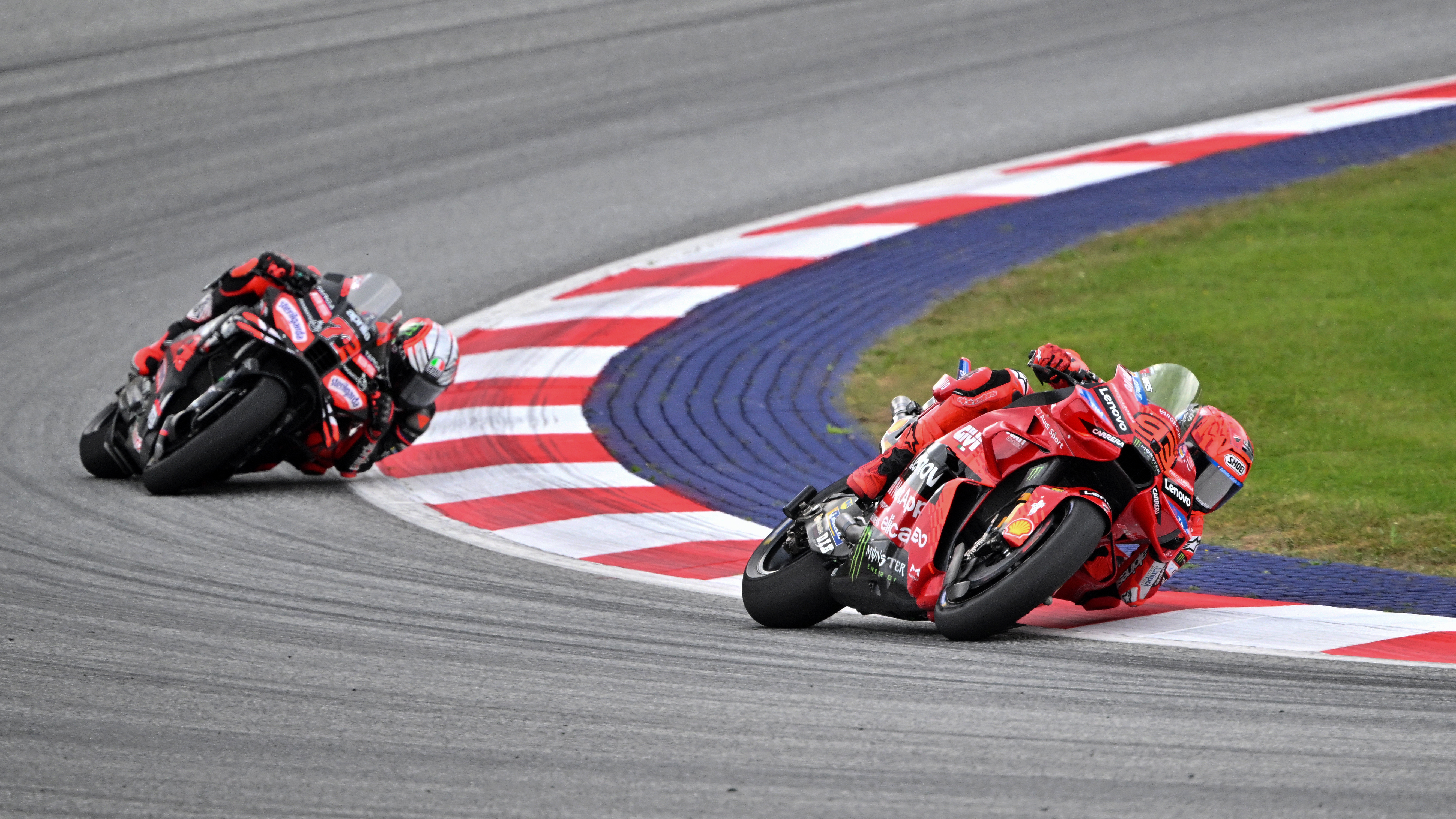 Marc Marquez and Marco Bezzecchi in action during the race.