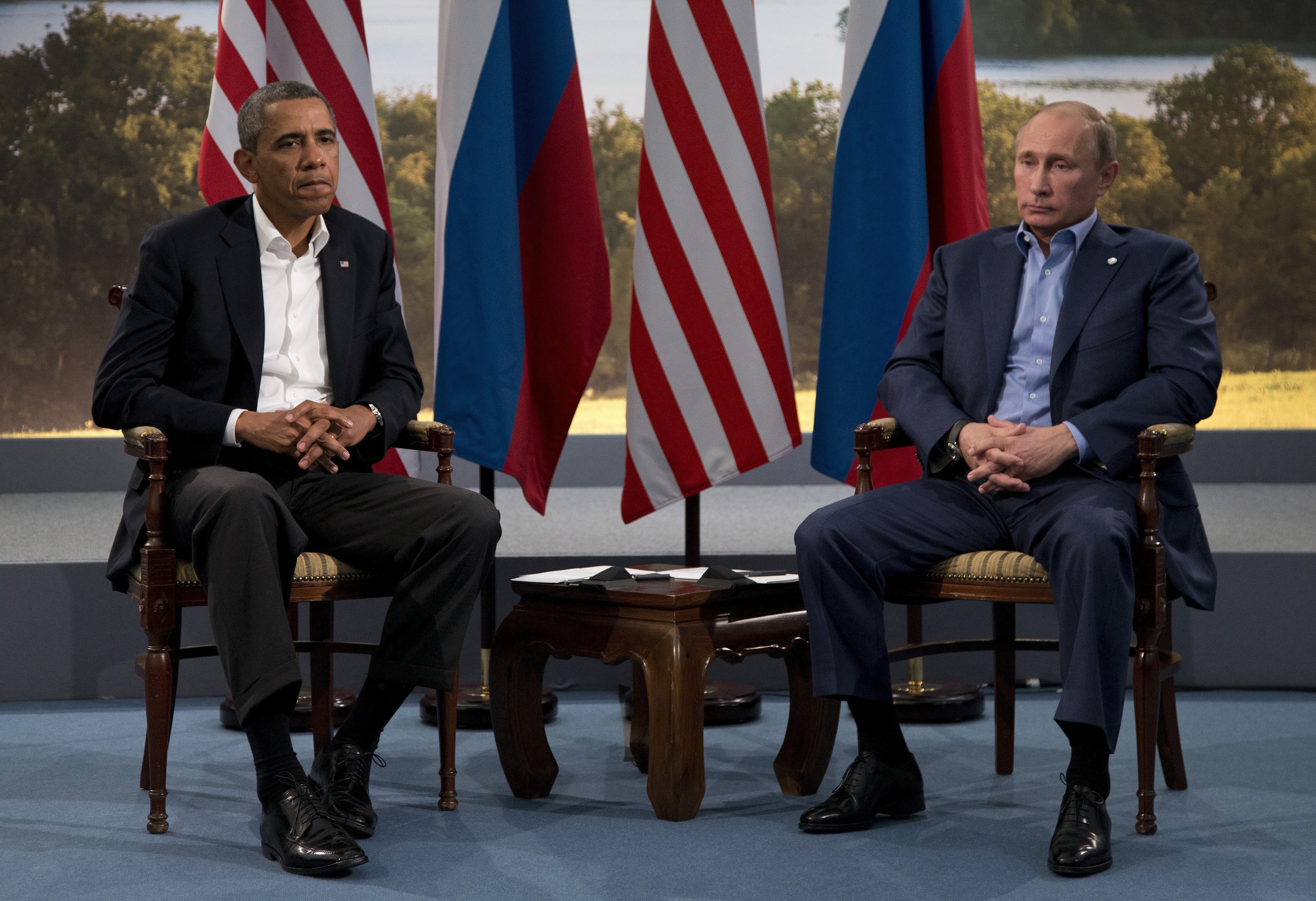FILE In this Monday, June 17, 2013 file photo President Barack Obama meets with Russian President Vladimir Putin in Enniskillen, Northern Ireland. (AP Photo/Evan Vucci, File)