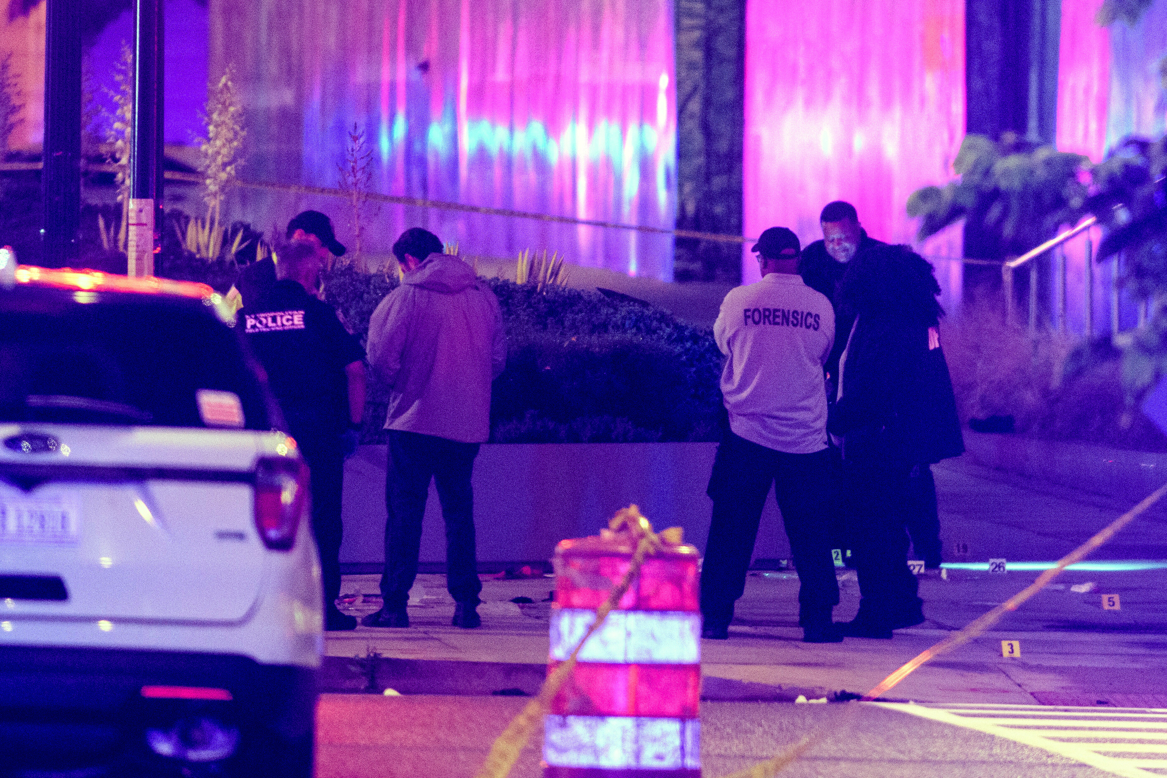 Law enforcement work the scene after two staff members of the Israeli Embassy in Washington were shot and killed outside the Capital Jewish Museum, Thursday, May 22, 2025, in Washington.. (AP Photo/Rod Lamkey, Jr.)