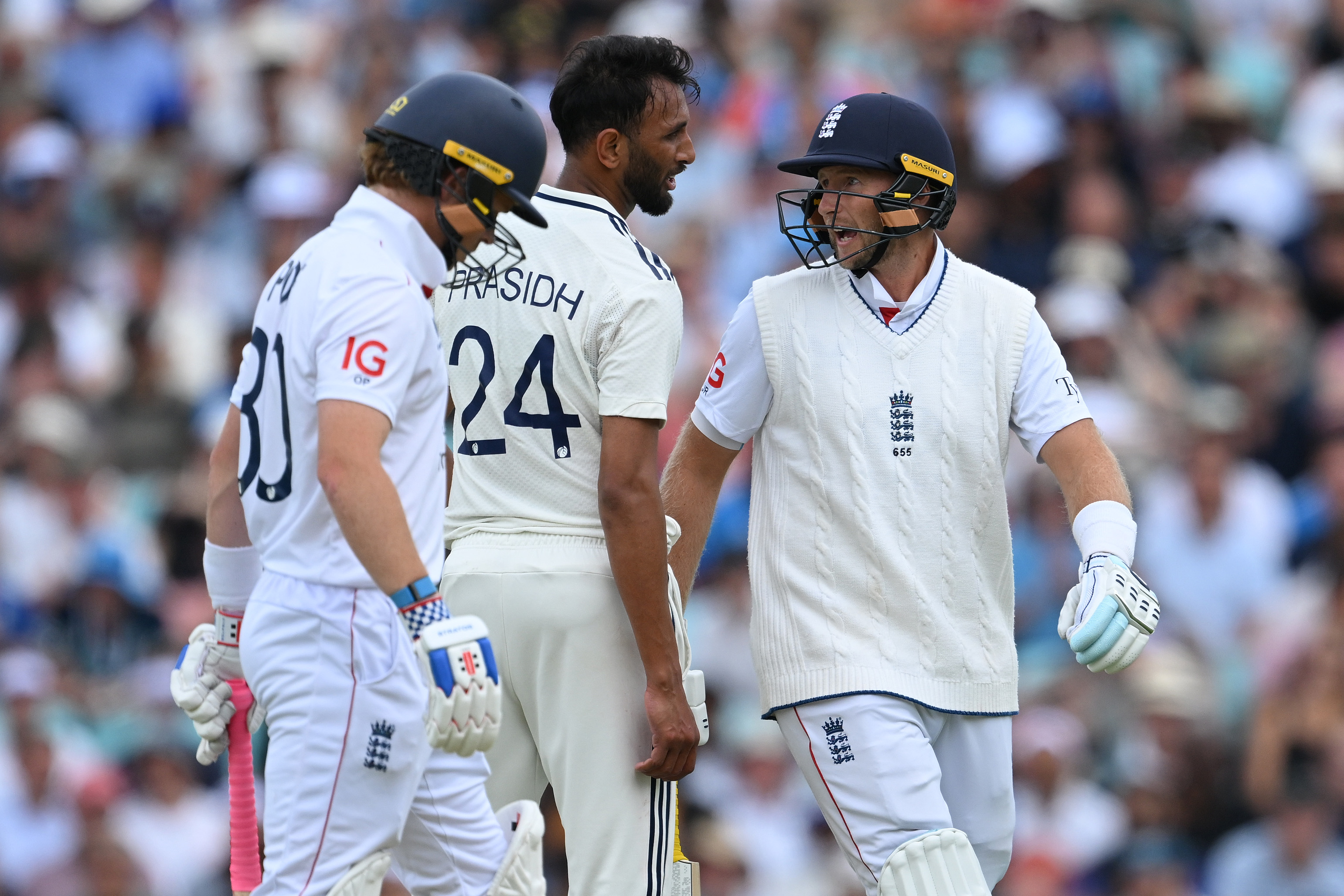 Joe Root of England has an angry exchange with Prasidh Krishna of India during Day Two of the 5th Rothesay Test Match