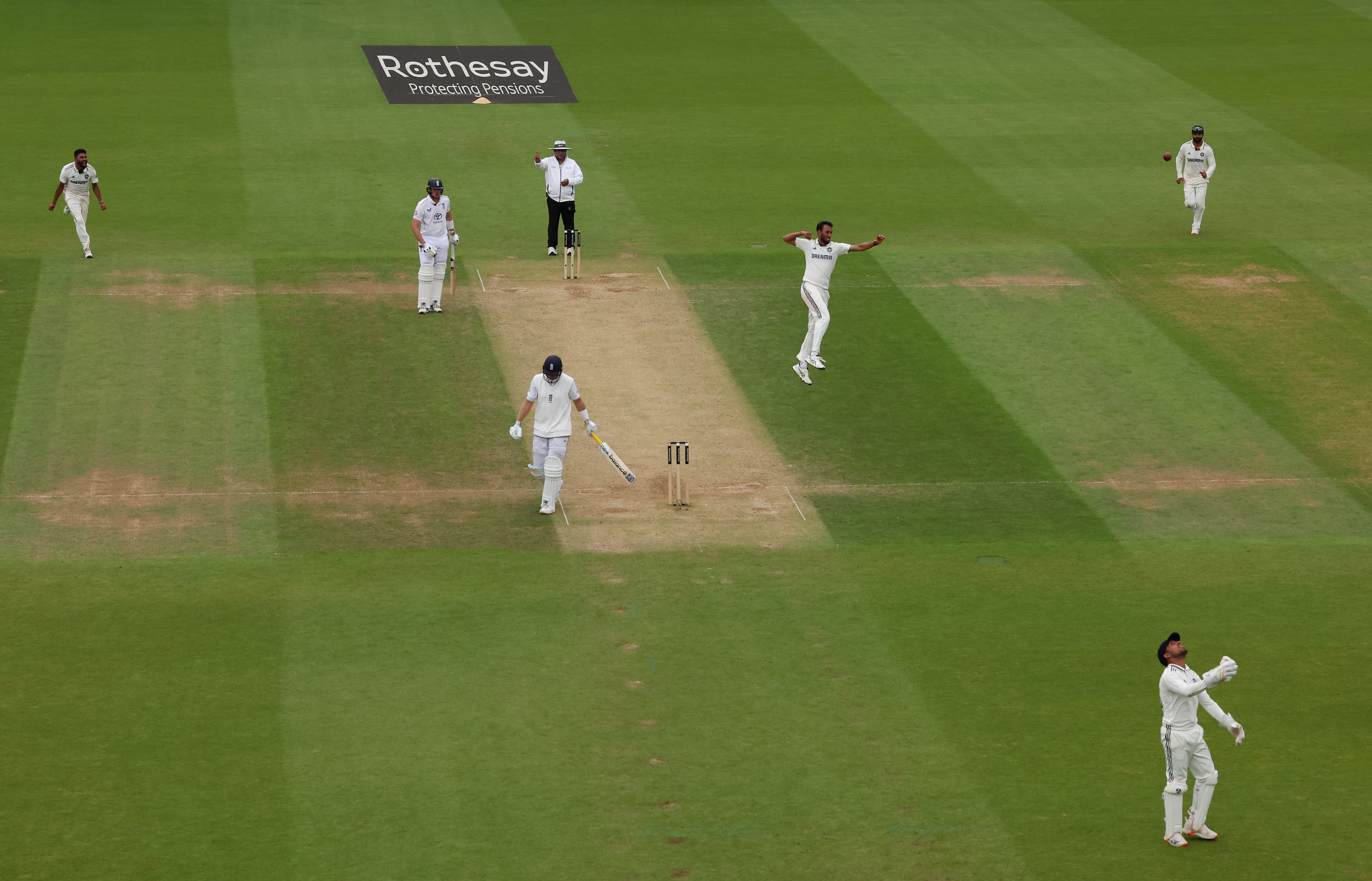 Prasidh Krishna of India celebrates the wicket of Joe Root of England during Day Four of the fifth Test
