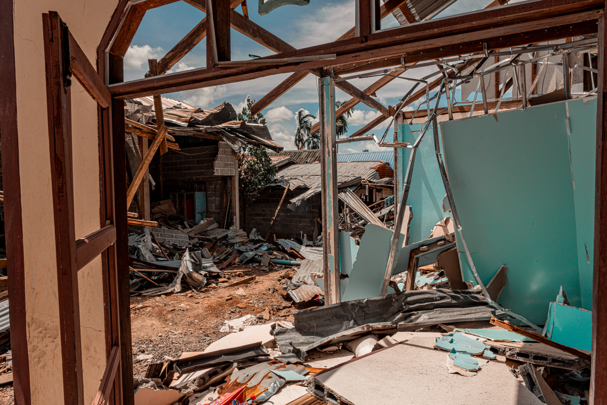 The remains of Netagit's home in Nam Yuen district, destroyed by Cambodian rocket fire on July 25, pictured on August 5.