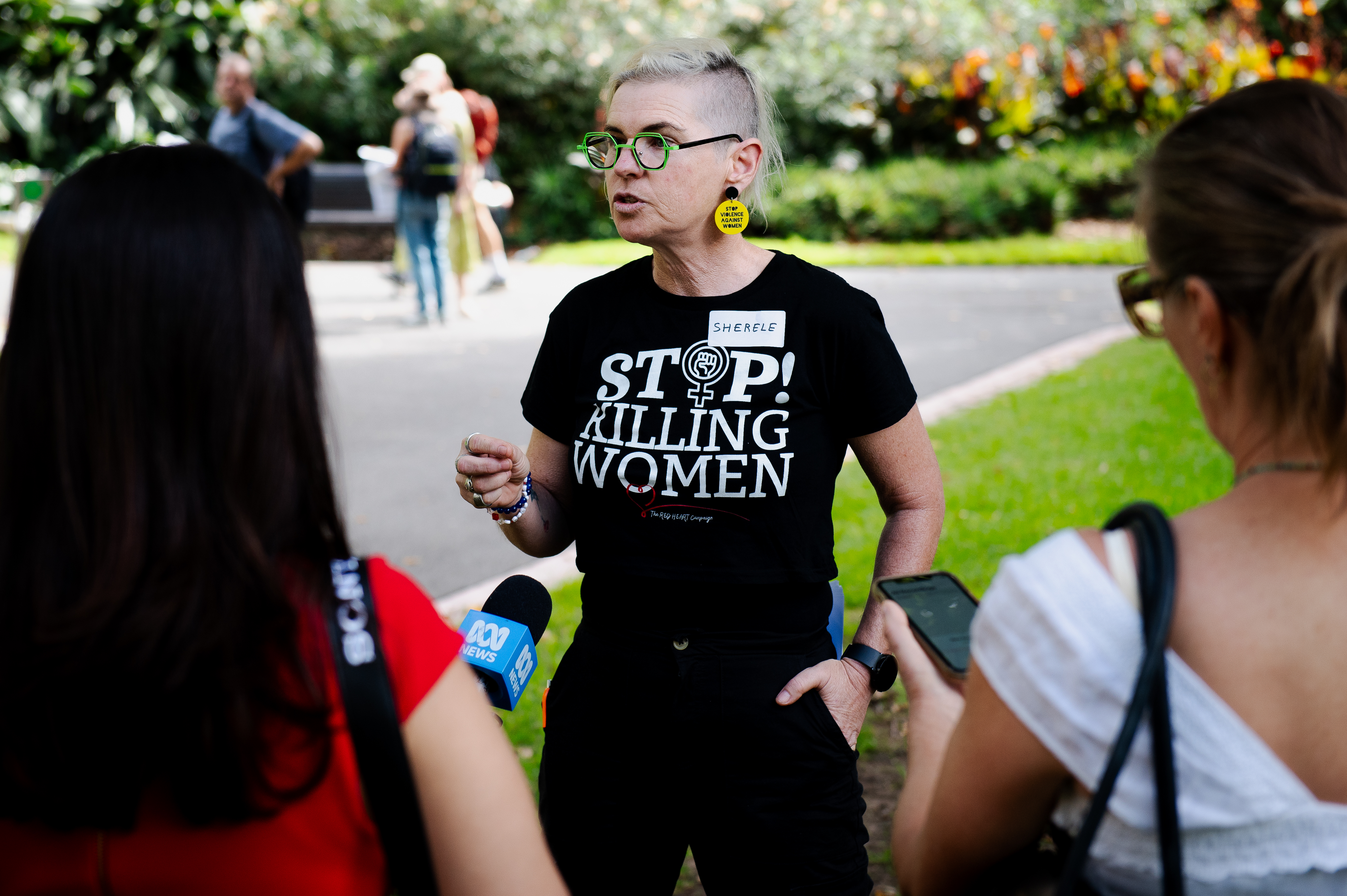Sherele Moody, from the Red Heart campaign, speaks with the media at a Stop Killing Women protest earlier this year in Melbourne, Australia. Moody says the official government data under-represents the true scale of femicide in Australia [Ali MC/Al Jazeera]