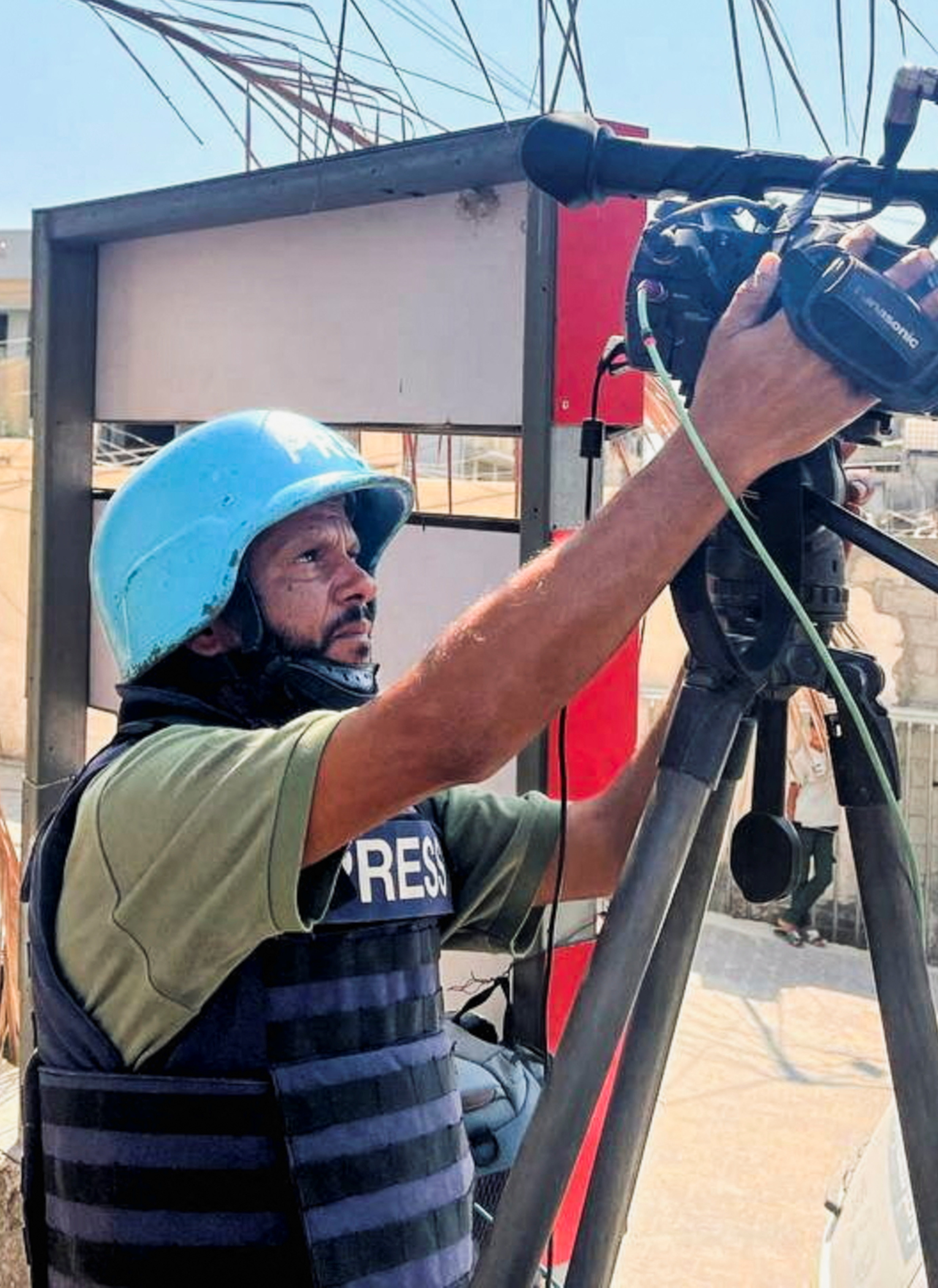 Palestinian cameraman Hussam al-Masri, who was a contractor for Reuters and killed in Israeli strikes on Nasser hospital on August 25, 2025, works at Nasser hospital in Khan Younis in the southern Gaza Strip August 7, 2024. REUTERS/Stringer