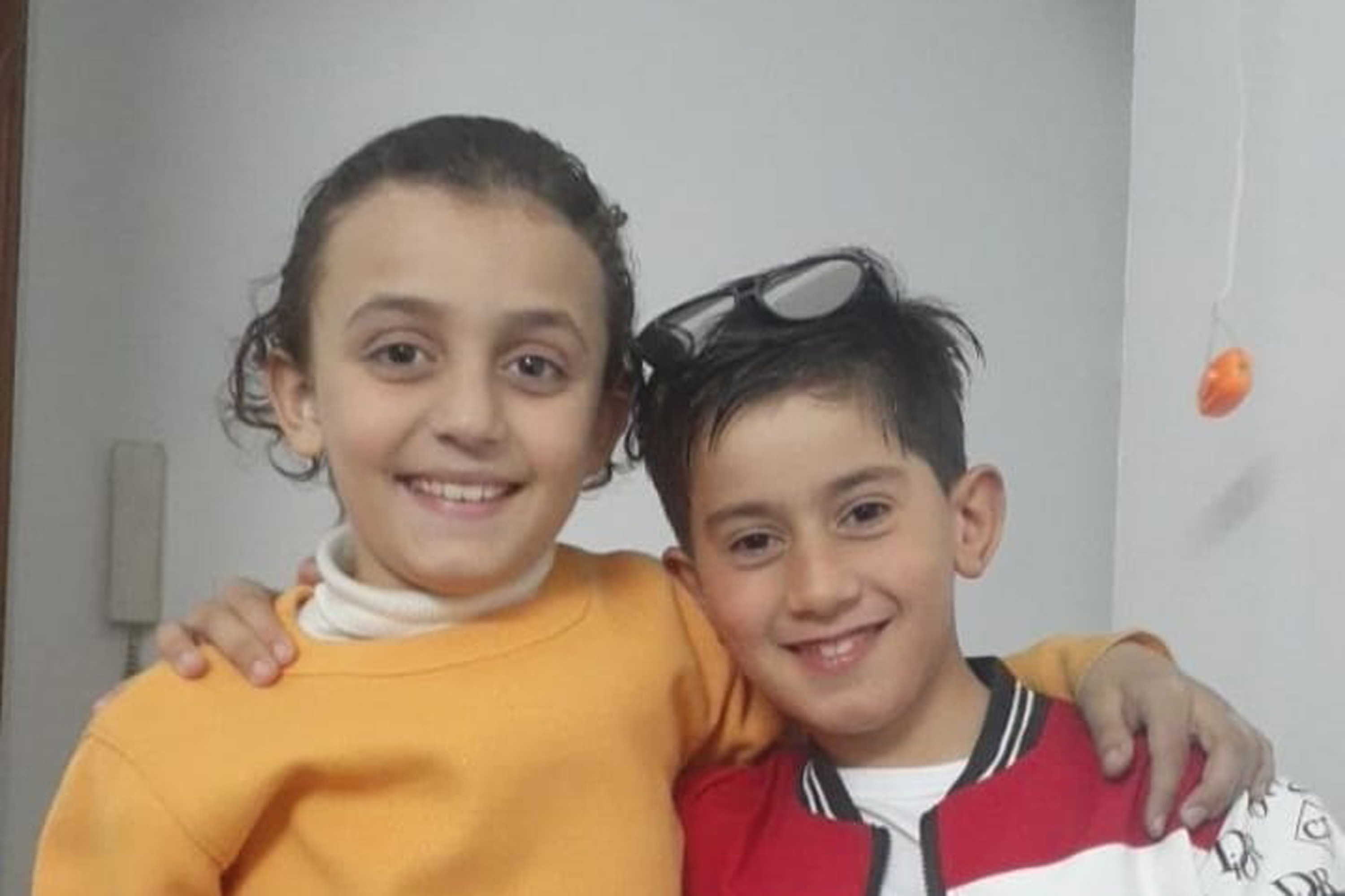 A photo of two boys posing