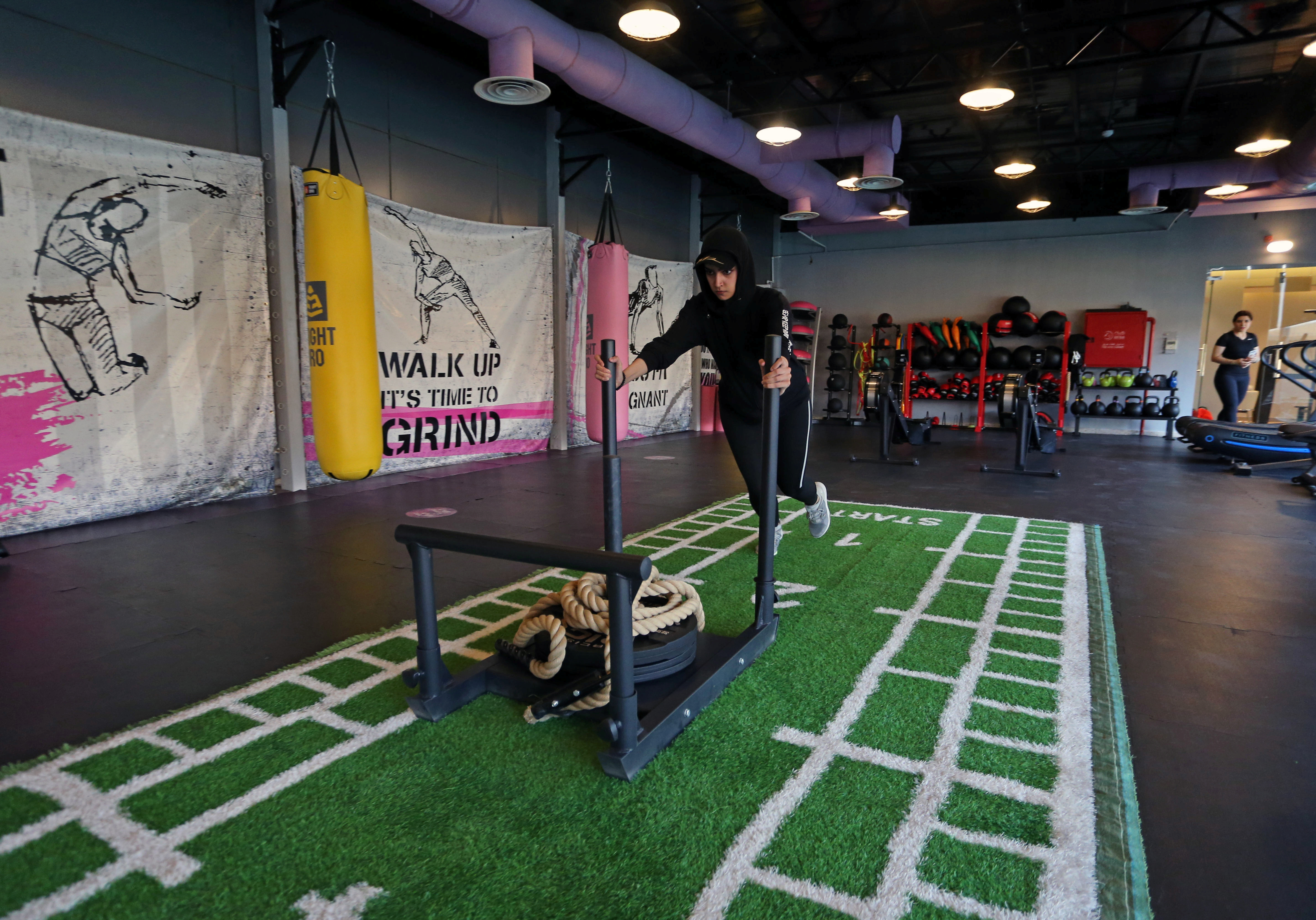 Saudi woman, Fayrouz Al-Omari, works out at a gym