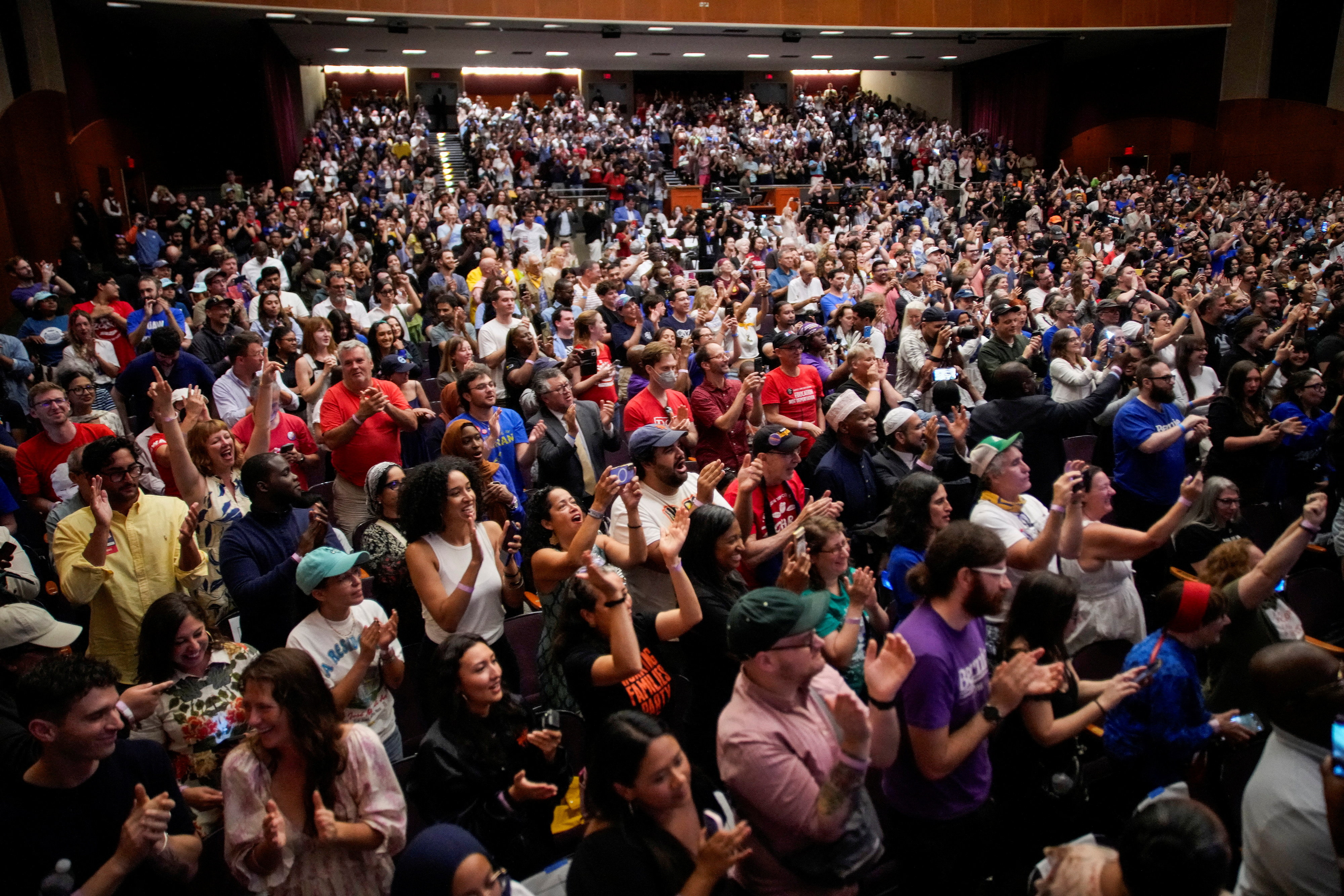 People attend a town hall meeting hosted by U.S. Senator Bernie Sanders (I-VT) and New York City mayoral candidate Zohran Mamdani at The Leonard & Claire Center for the Performing Arts in Brooklyn, New York, September 6, 2025. REUTERS/Eduardo Munoz